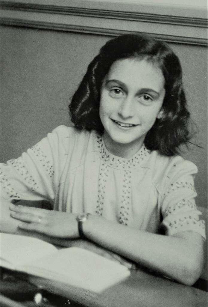 Anne Frank smiles at the school photographer. Source: PICRYL