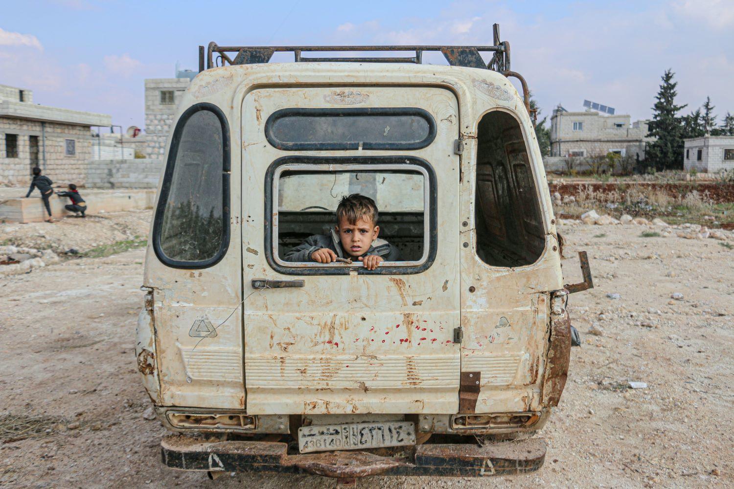 A kid in an empty van