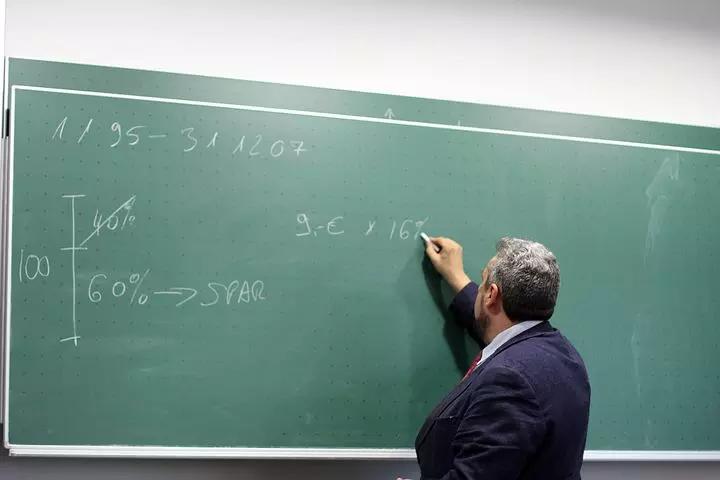 A math private tutor conducting a lesson