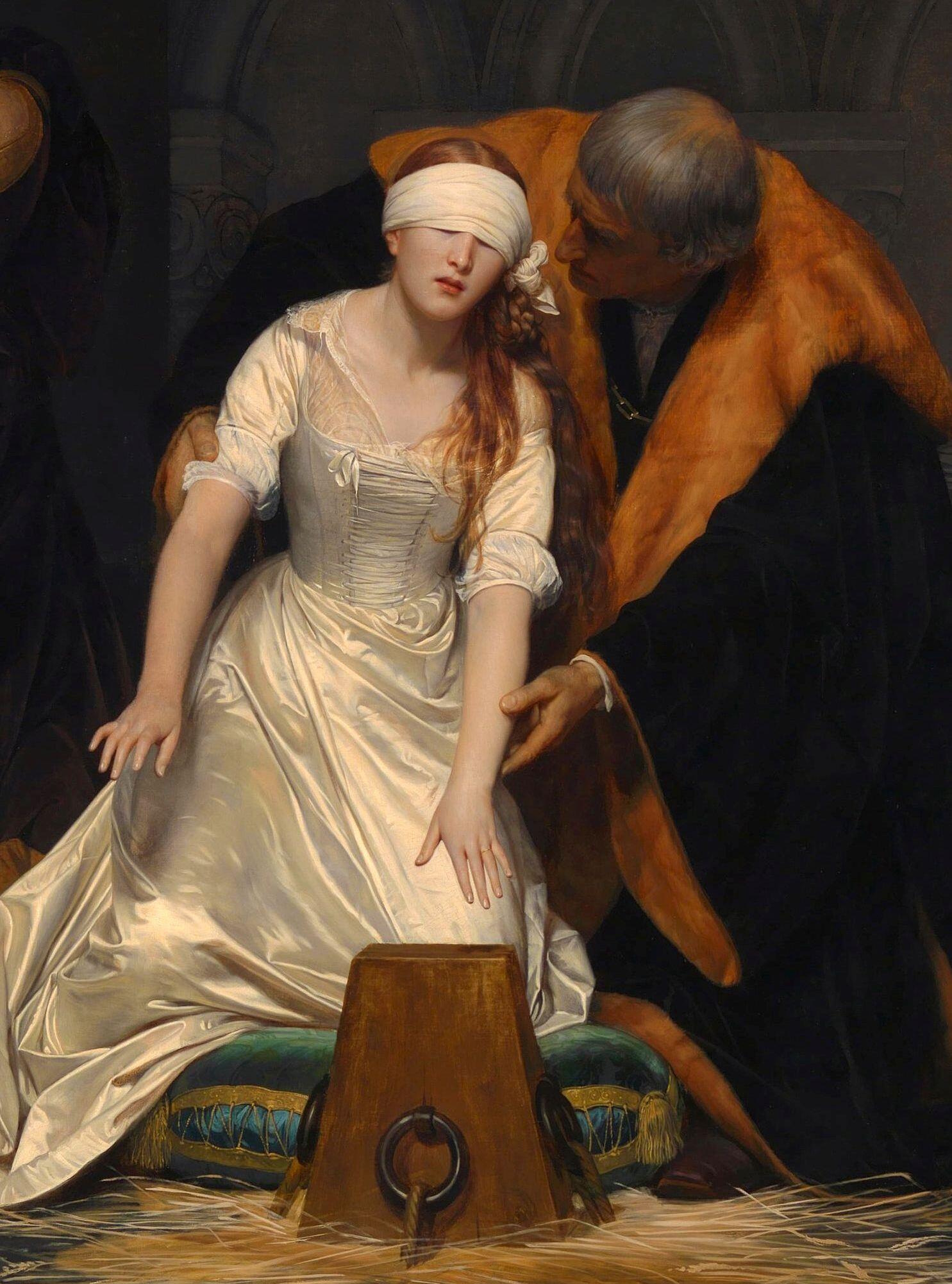 A detail of the painting of the execution of Lady Jane Grey, depicting the young queen dressed in a white gown, blindfolded, and guided toward the execution block. Source: Wikimedia commons.