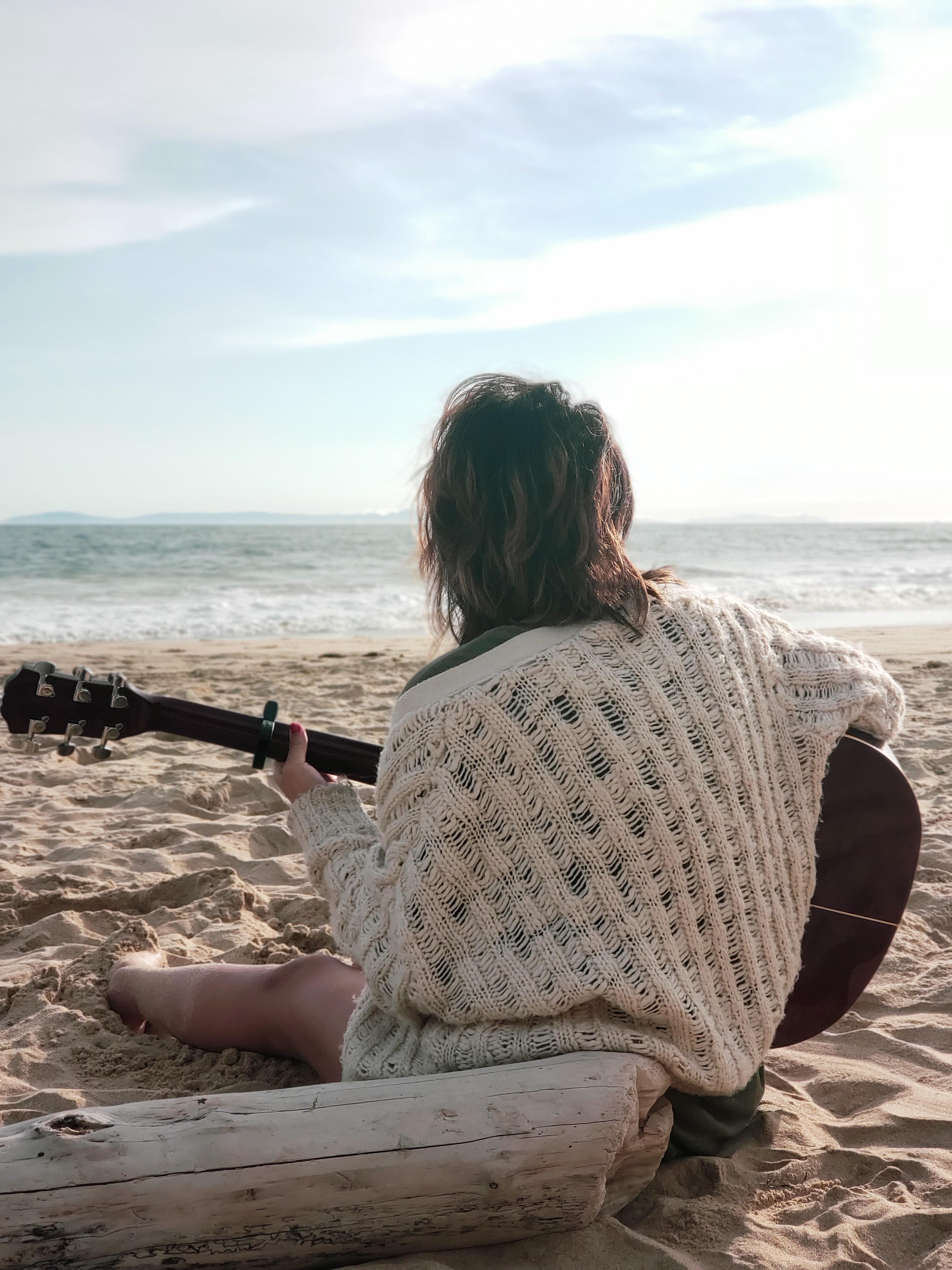 Woman playing guitar