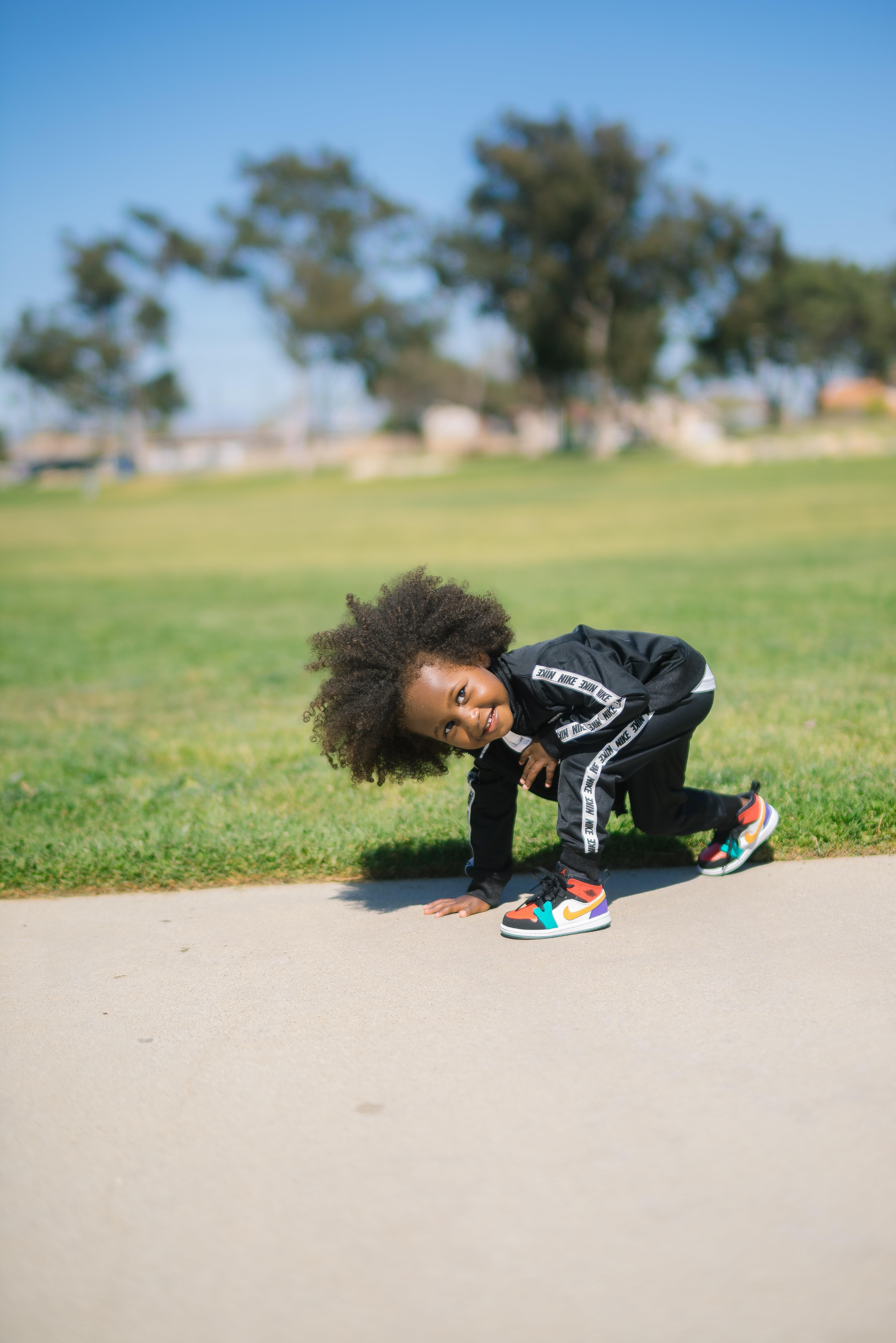 a child plays outdoors