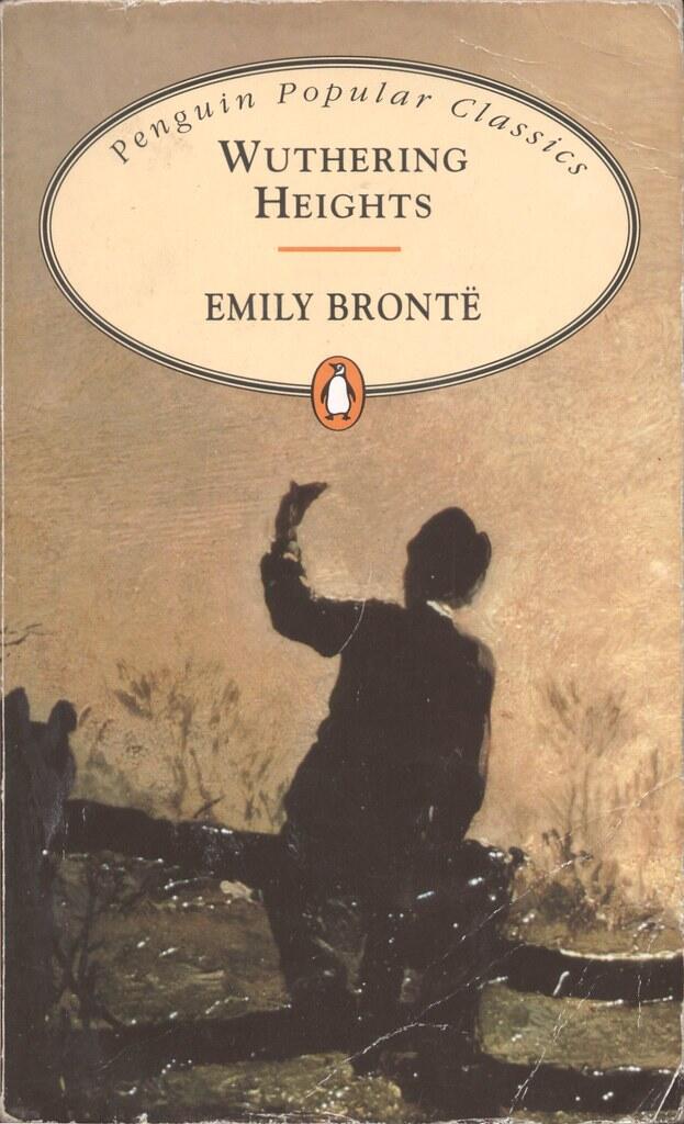 Book cover of "Wuthering Heights" by Emily Brontë, Penguin Popular Classics edition, featuring a silhouette of a person against a brownish background.