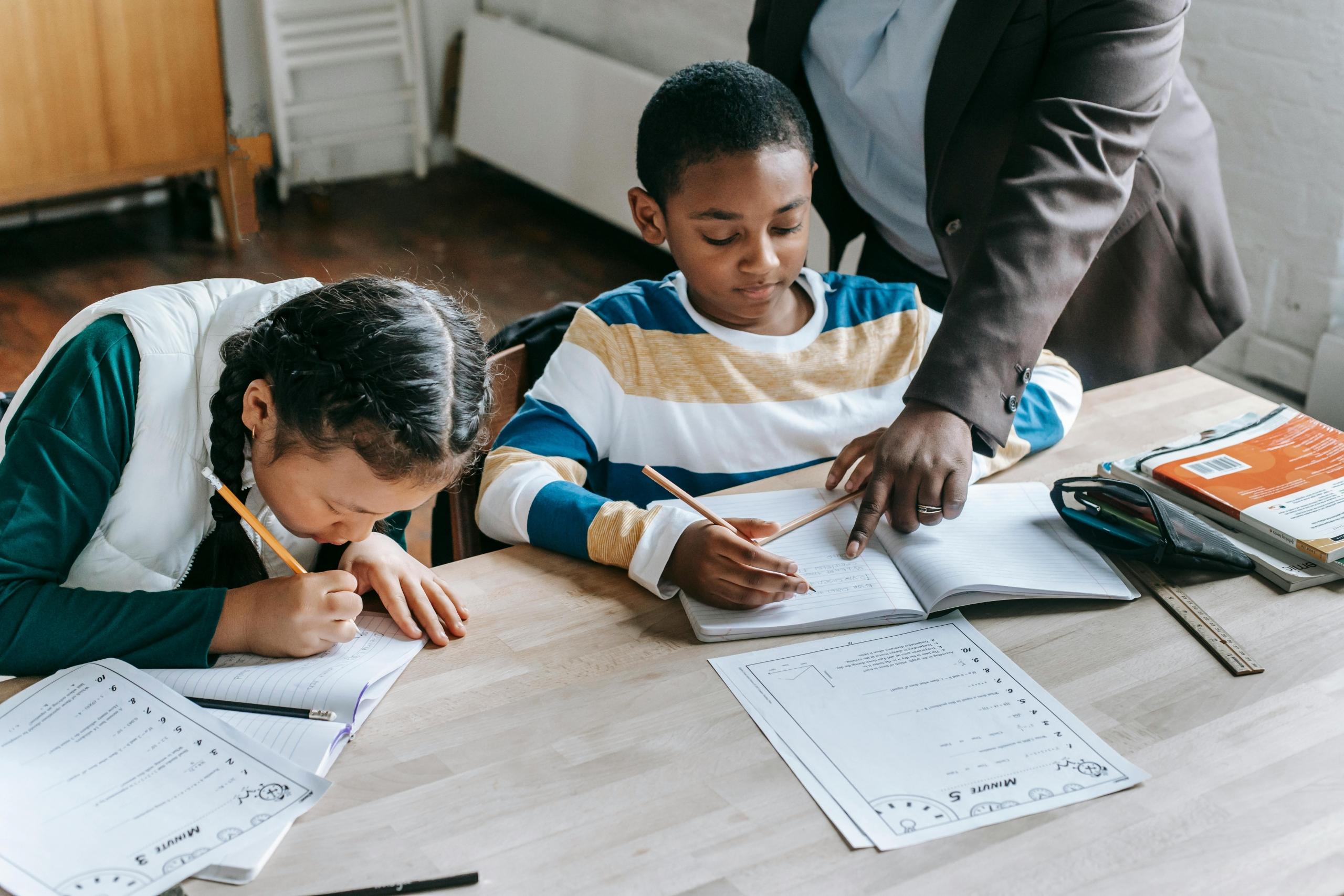 children learn with a tutor