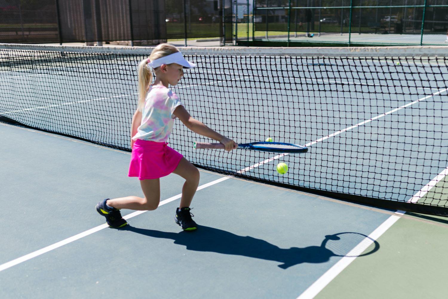 Kids playing tennis