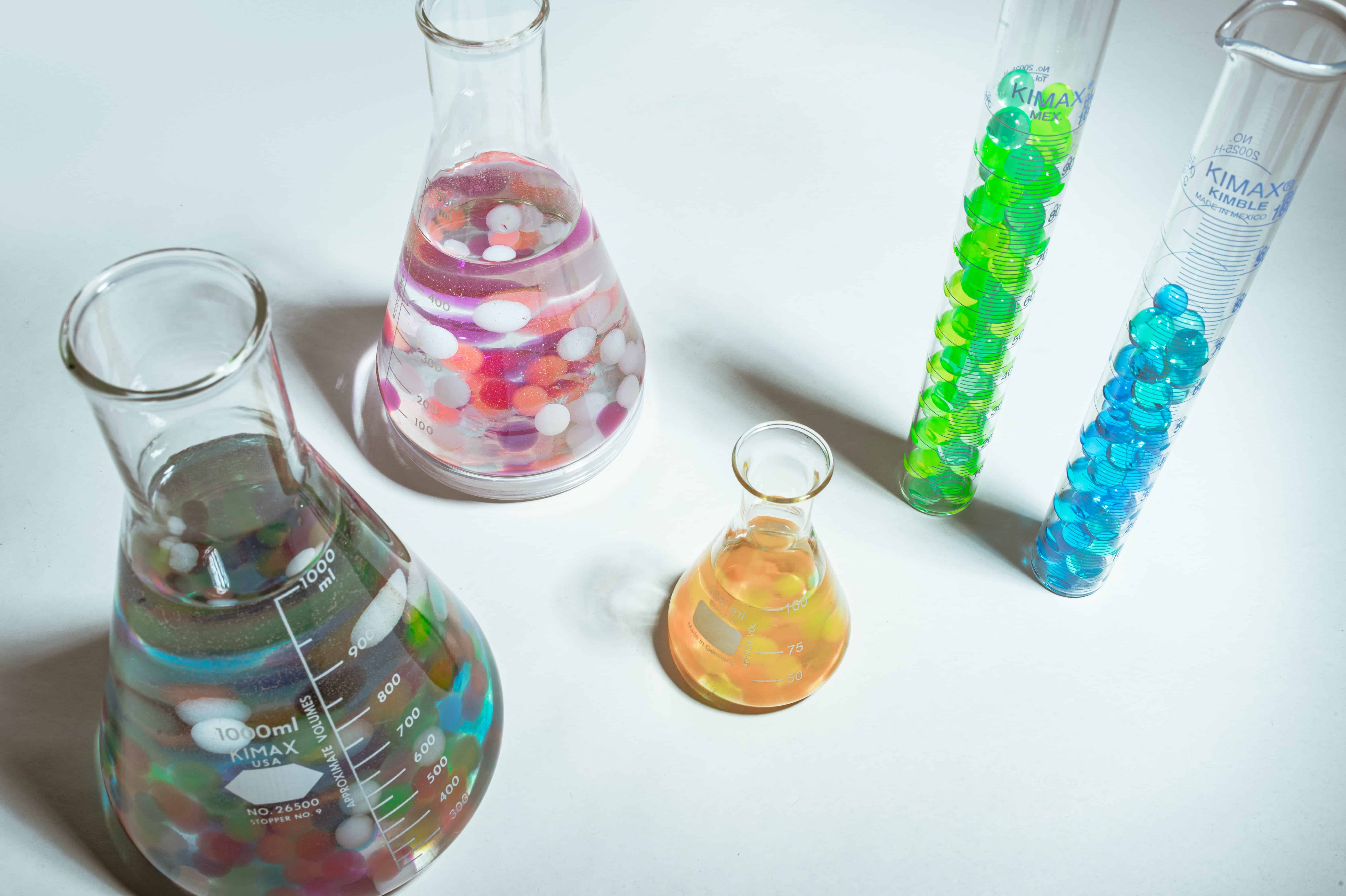chemistry flasks and test tubes filled with colourful fluid