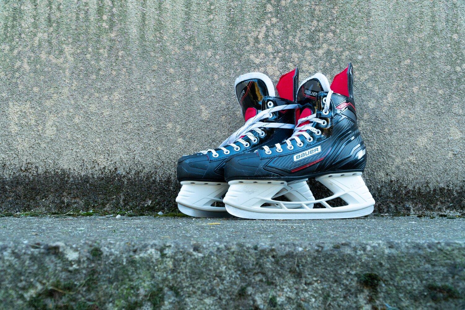 Black and white ice skates