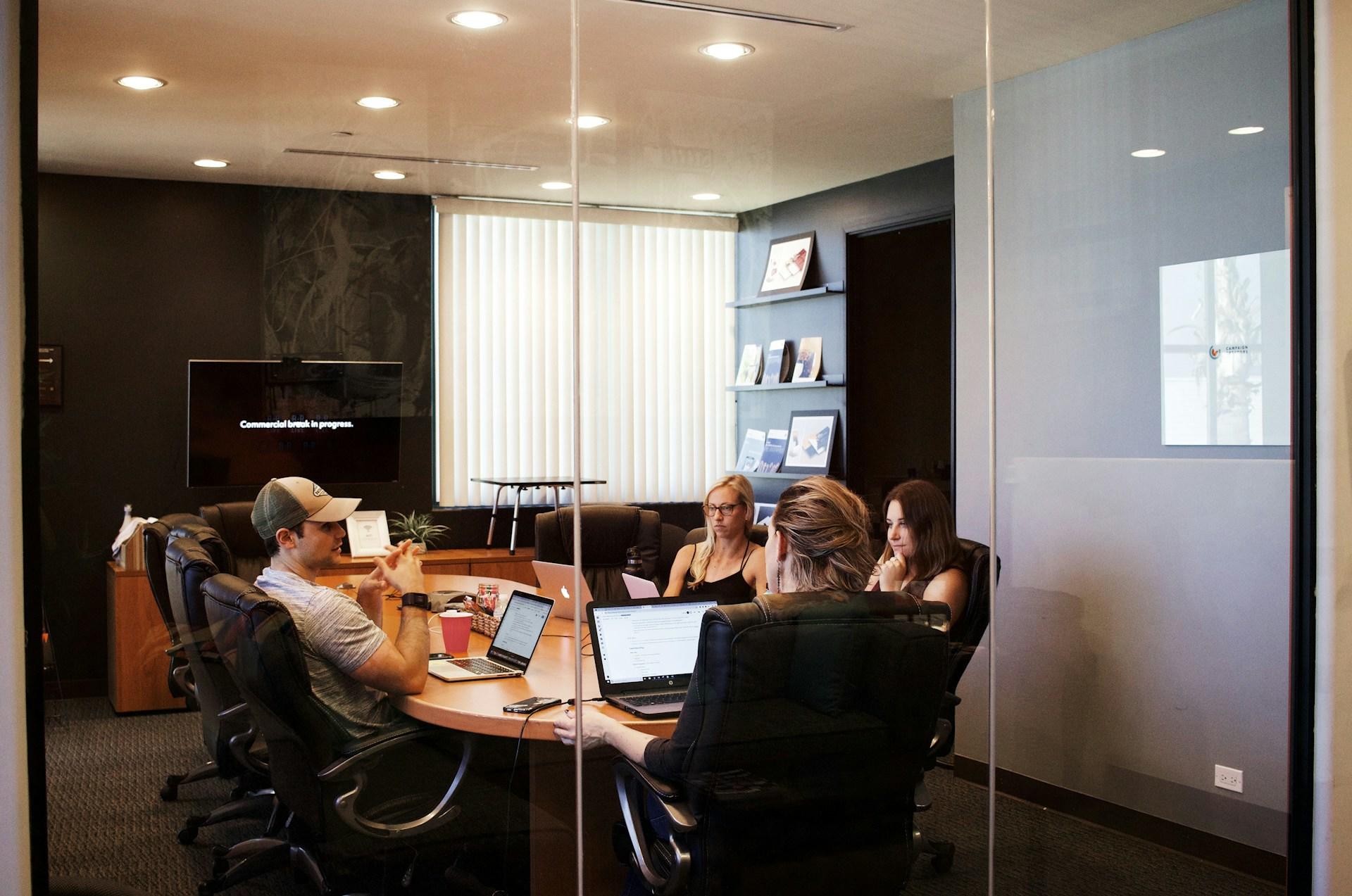 A family lawyer working with 3 family members in her office.
