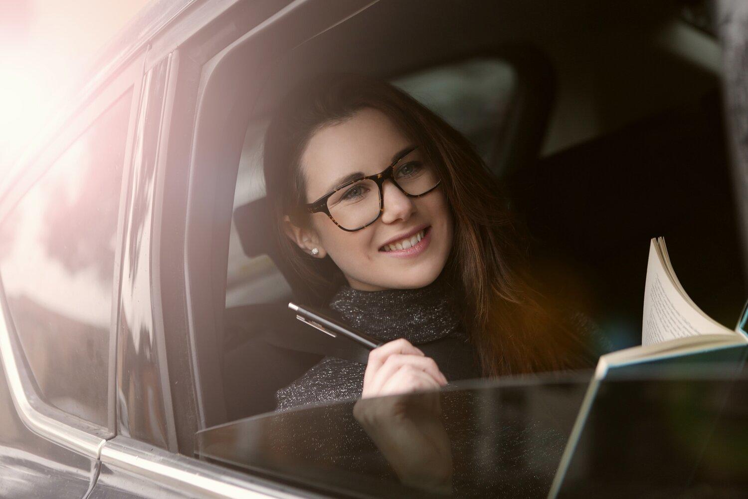 A woman inside a car