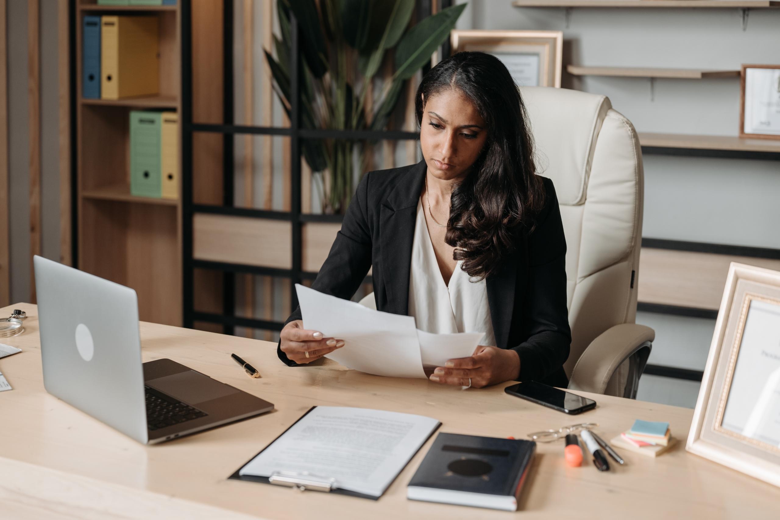 A lawyer works at her desk.