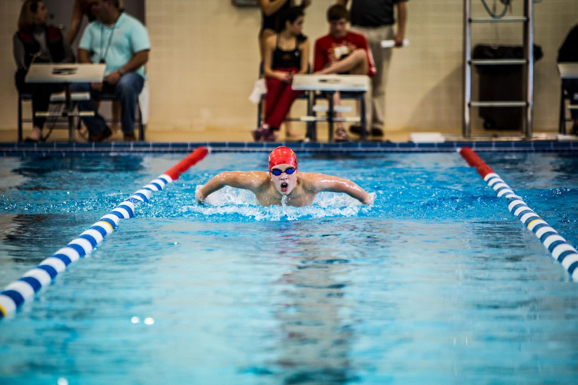 Athlete swimming in pool