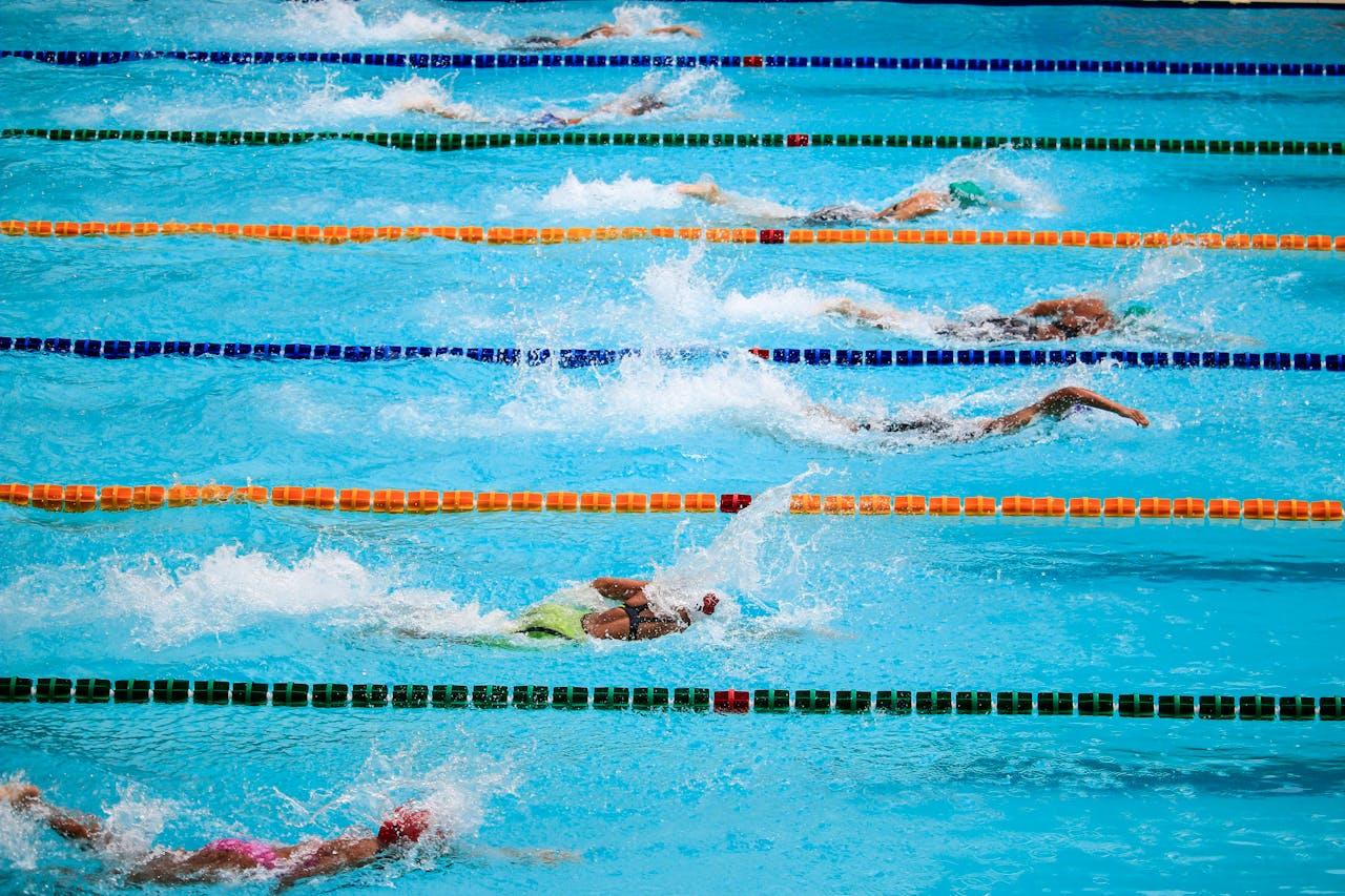 7 swimmers competing in a professional meet.