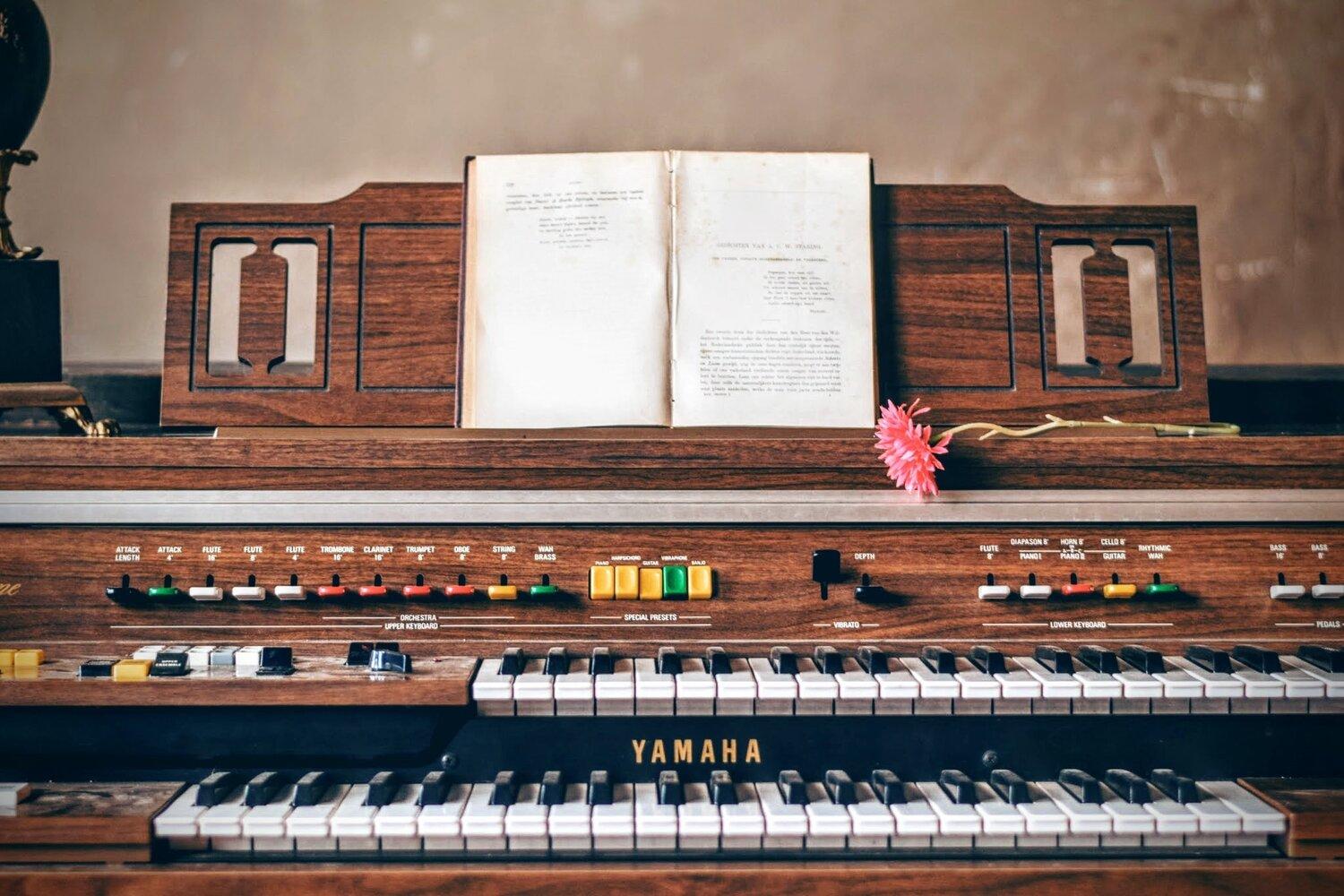 A piano and a book