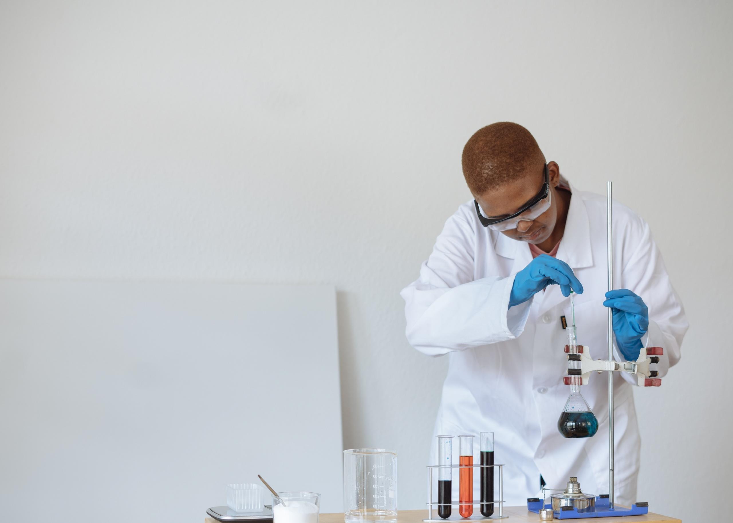 A chemistry teacher conducts an experiment.