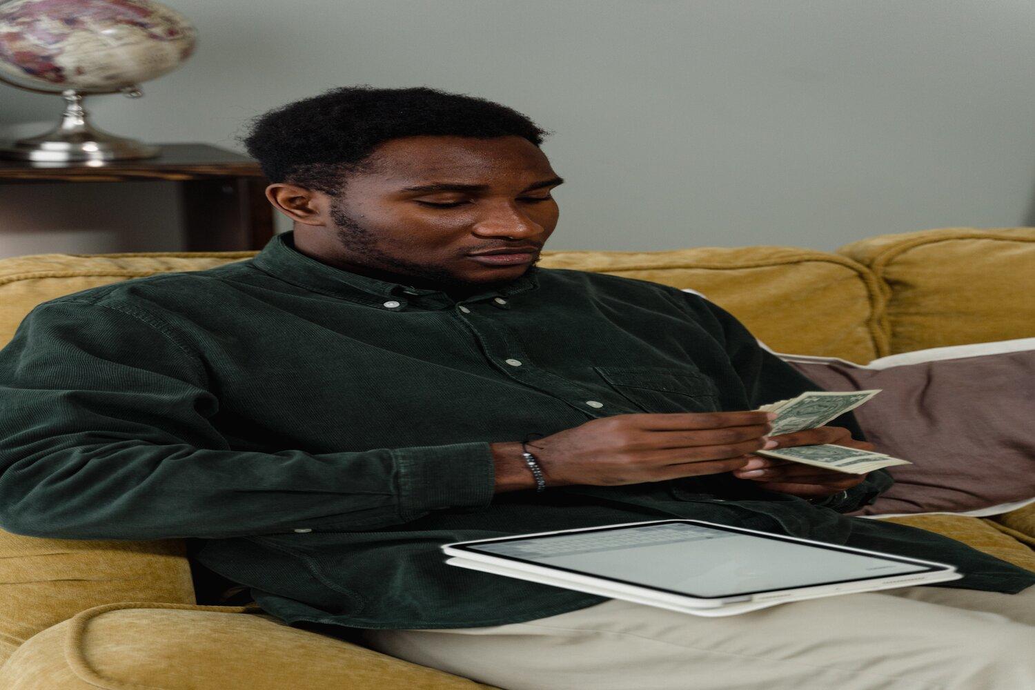 A man counting money.
