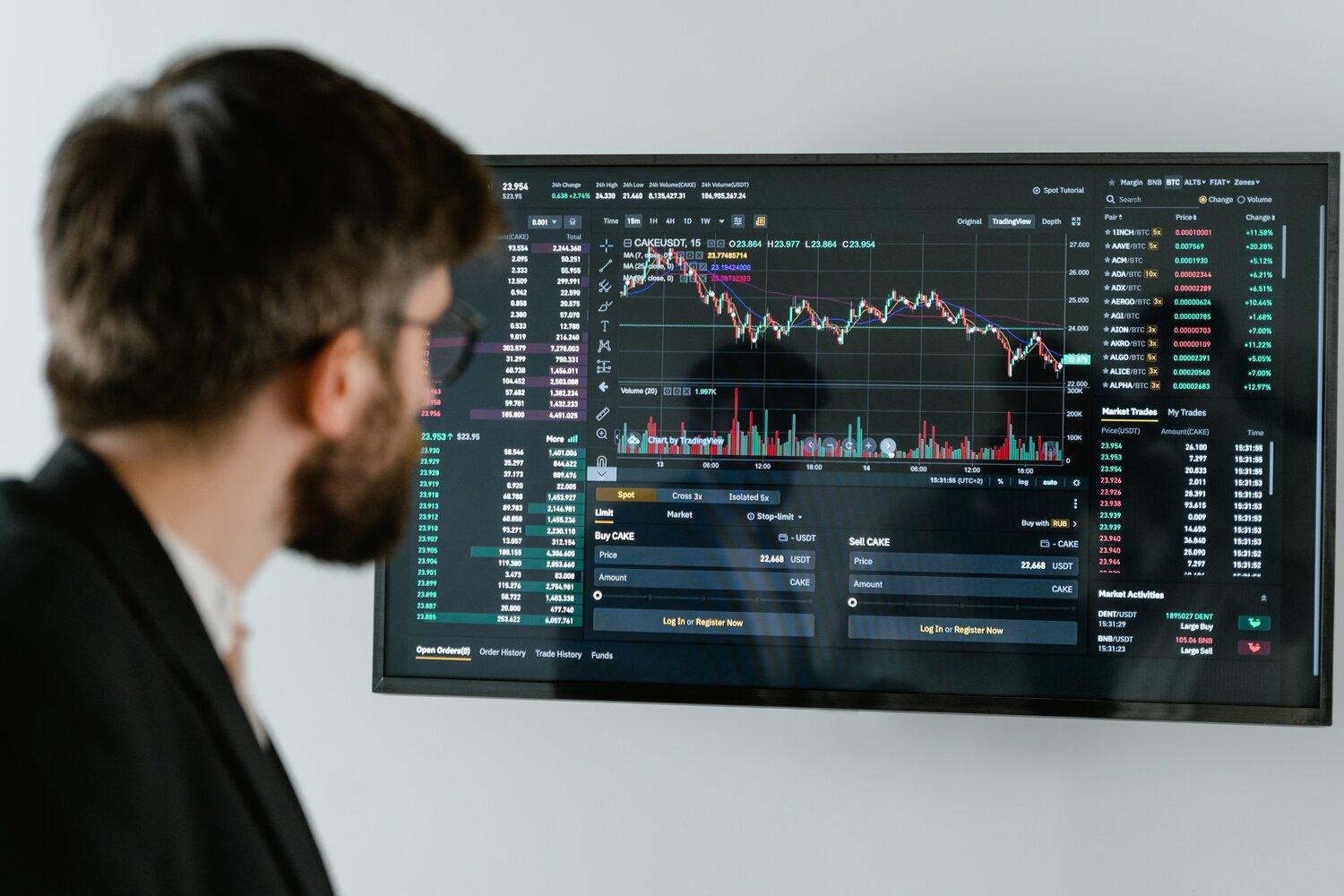 A man staring at a computer screen