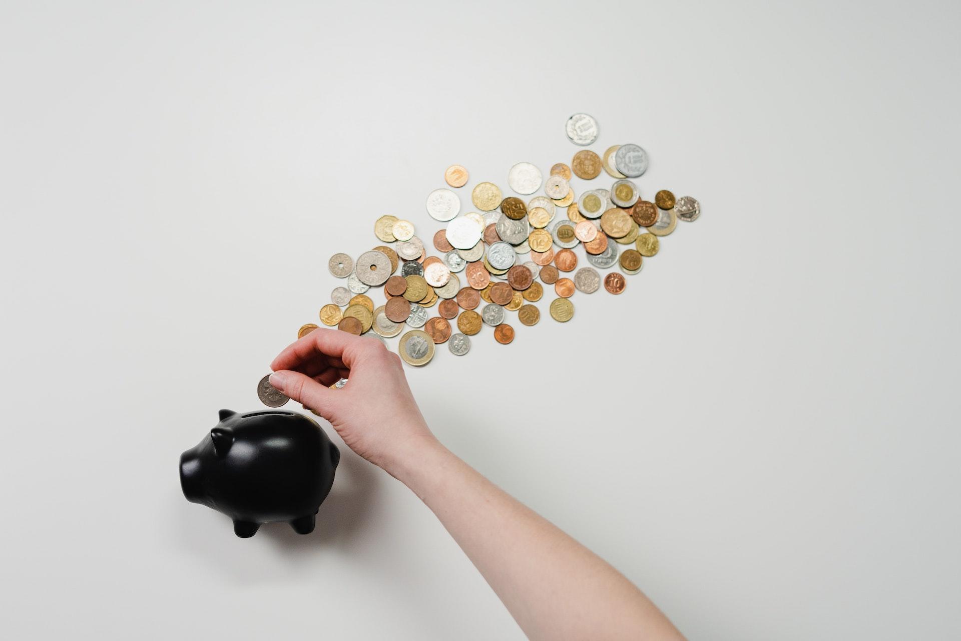 piggy bank coins spilling out