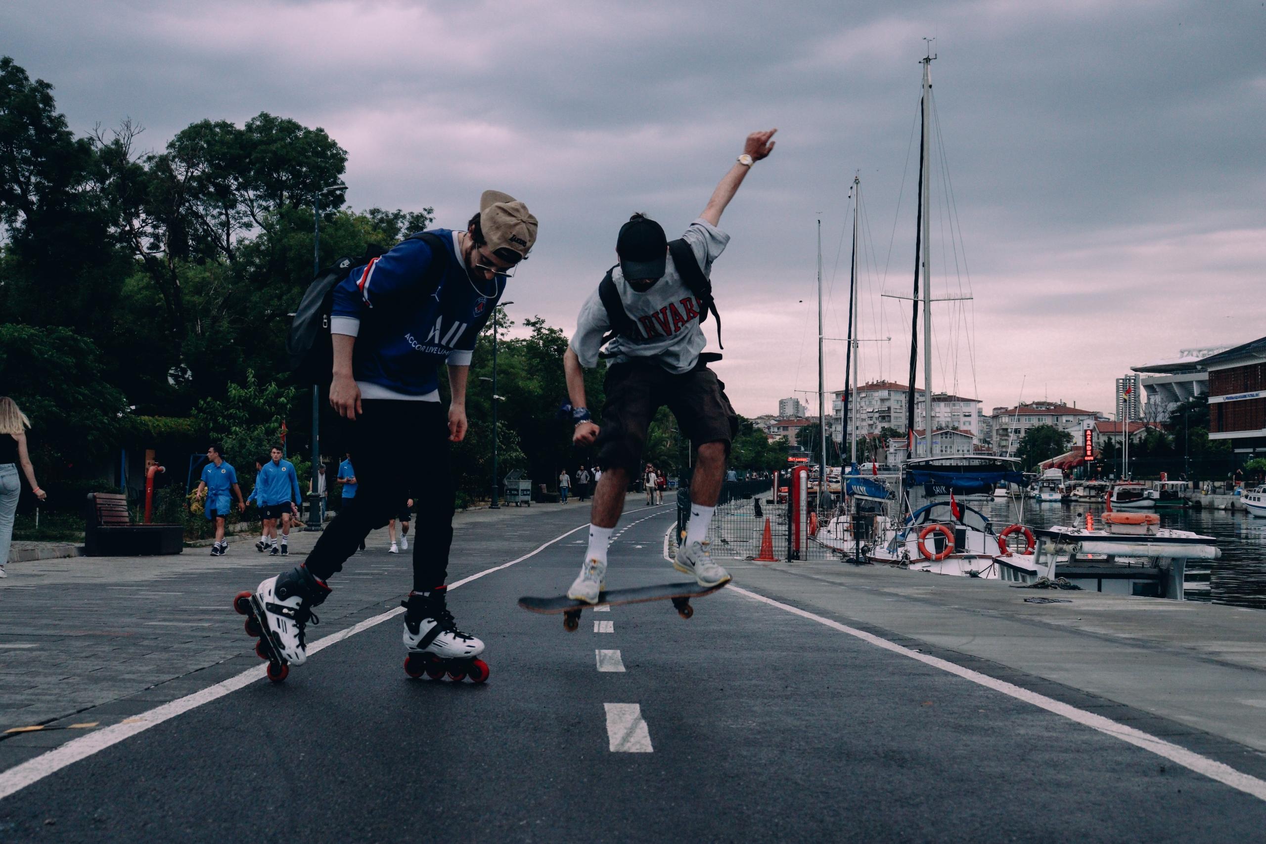 two roller bladers skate