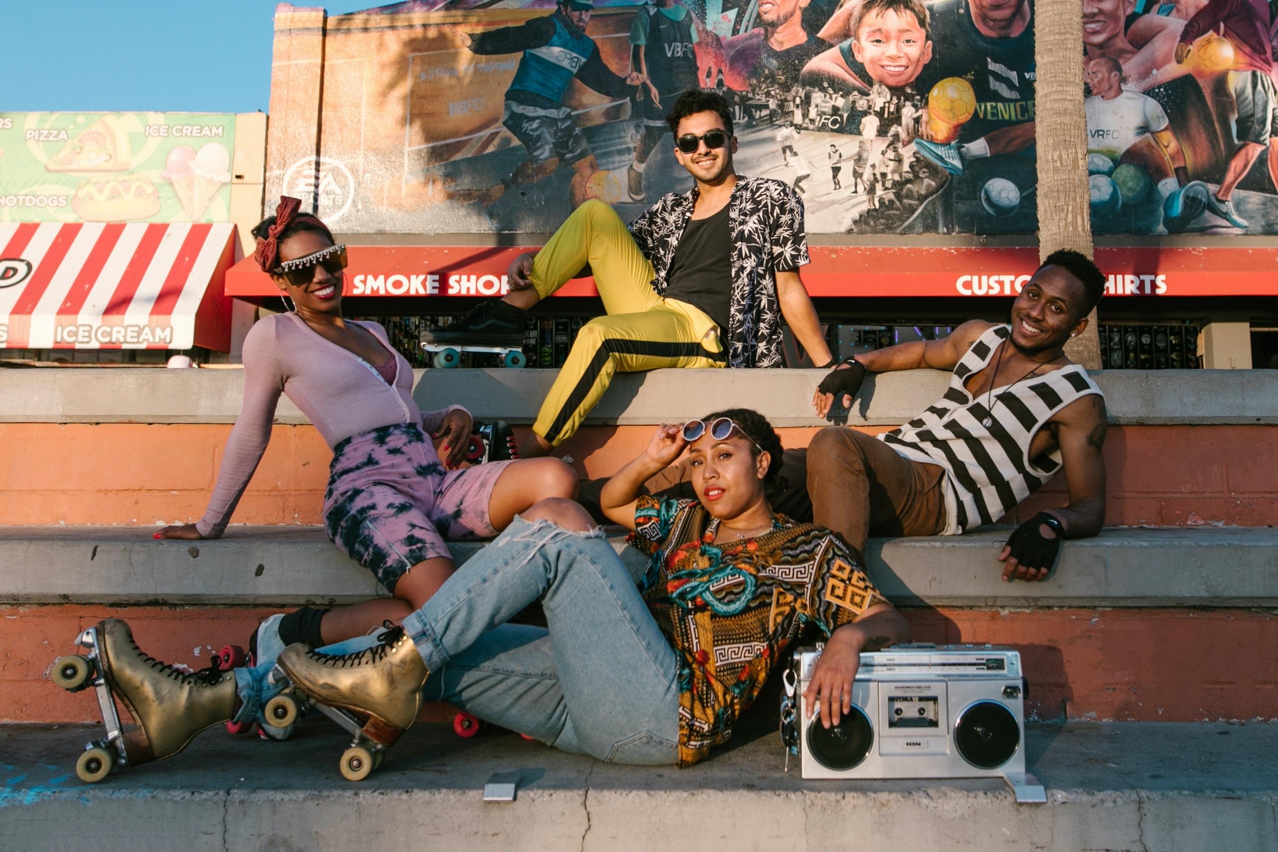 A group of friends pose for a picture.