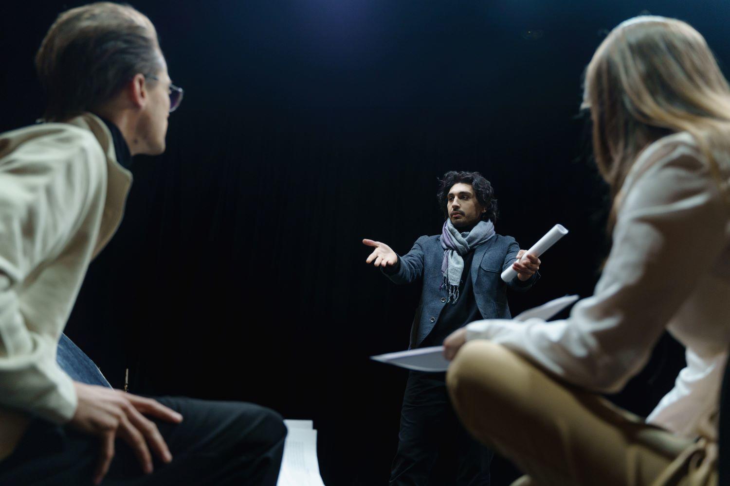 A stage director with actors