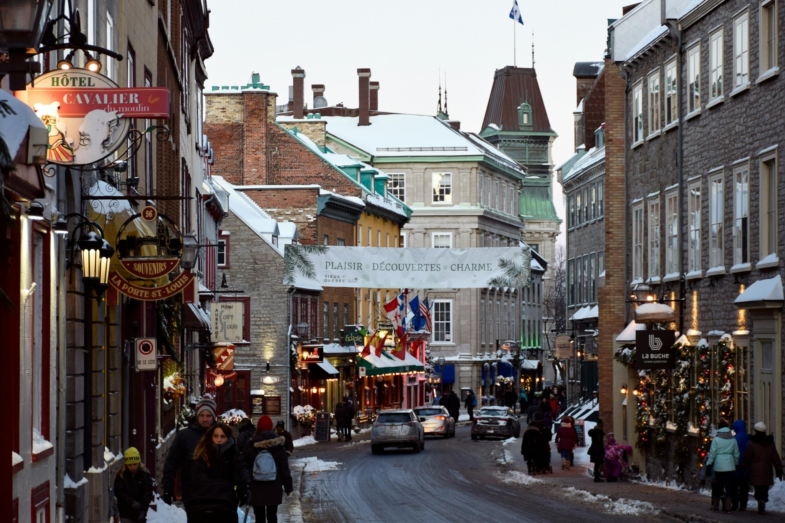 The picture shows the snowy center of Quebec City during the afternoon.