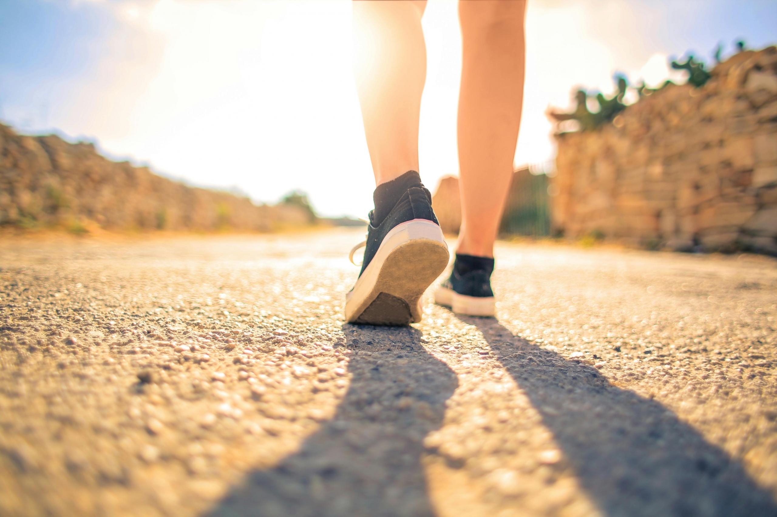 a person walks on the road.