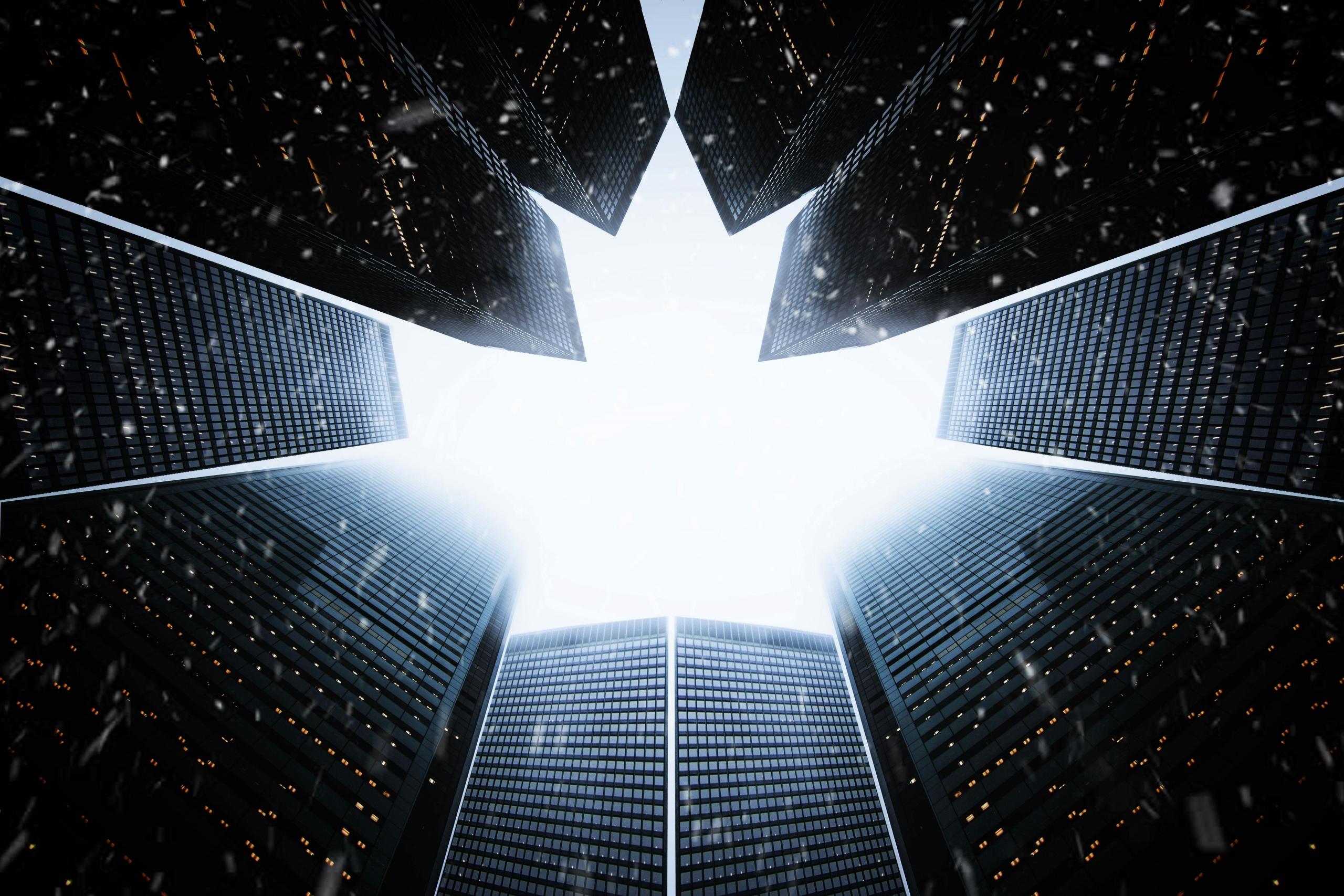 Skyscrapers are arranged to form the outline of a maple leaf. The Maple Leaf is white.