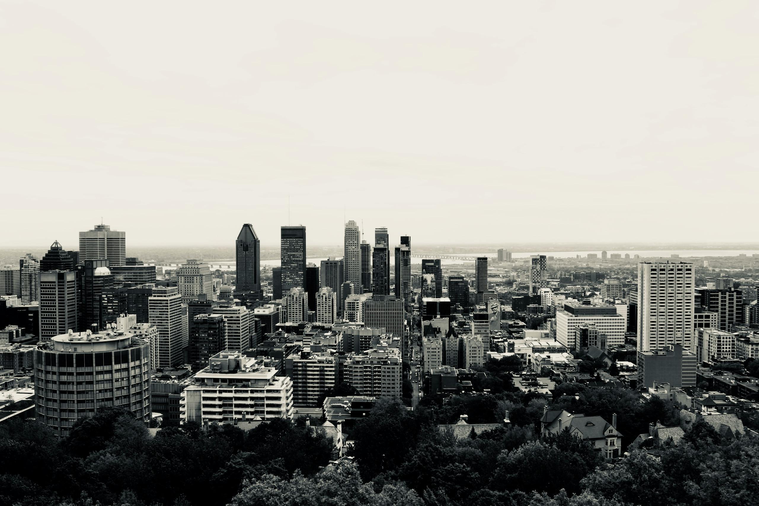 a black and white photo of the Montreal skyline.