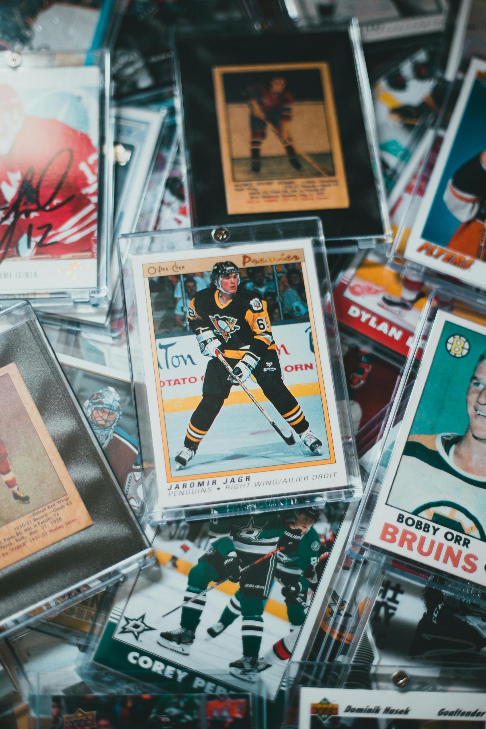 a pile of vintage hockey cards with Jaromir Jagr's card at the center.