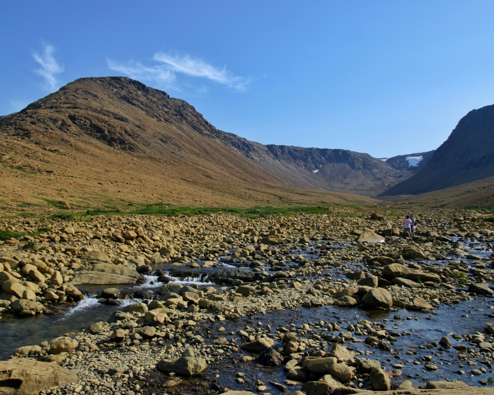 The Tablelands in Gros Morne National Park, a unique orange-hued rocky landscape.