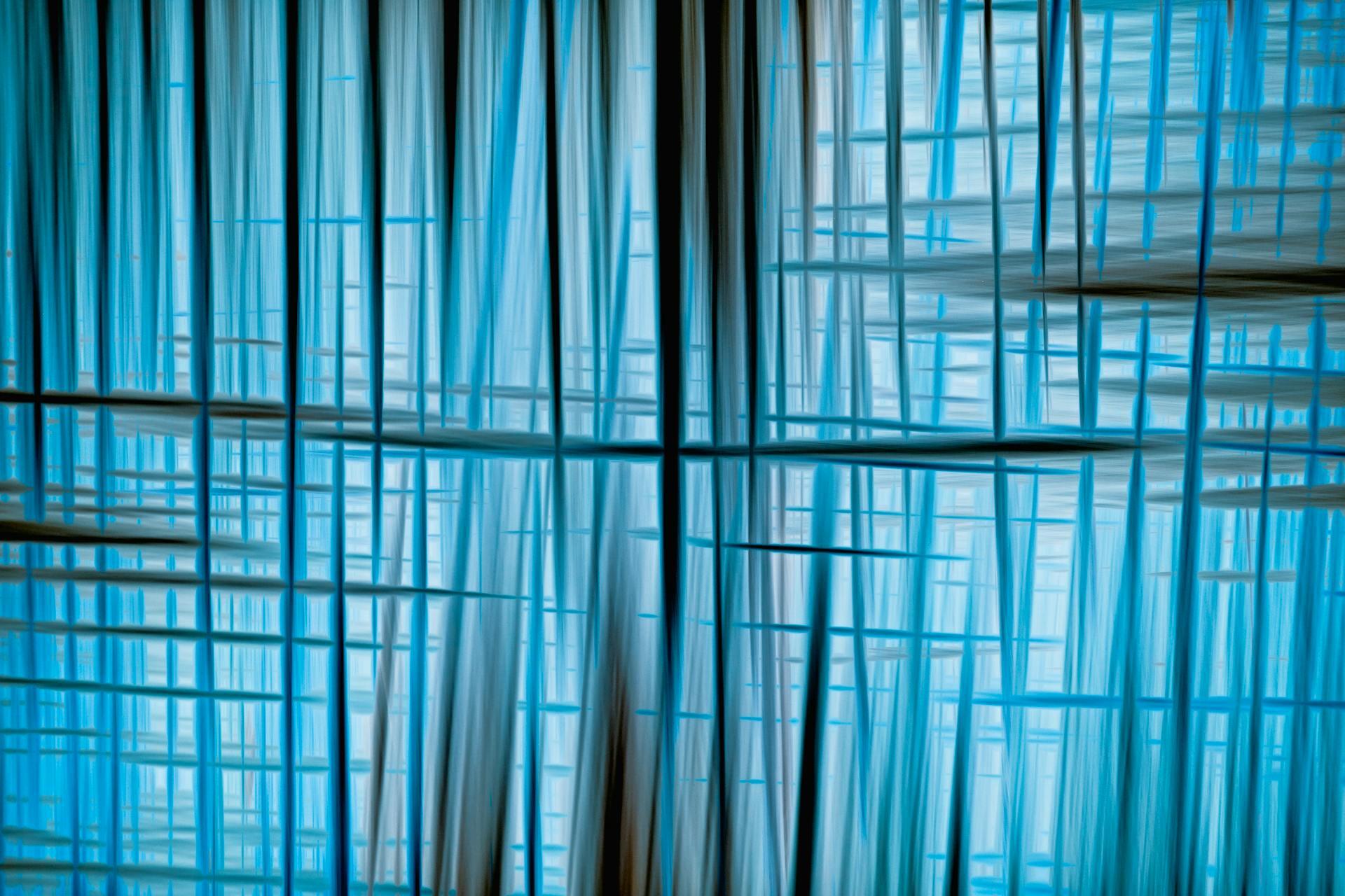 Abstract blue background with lines and squares