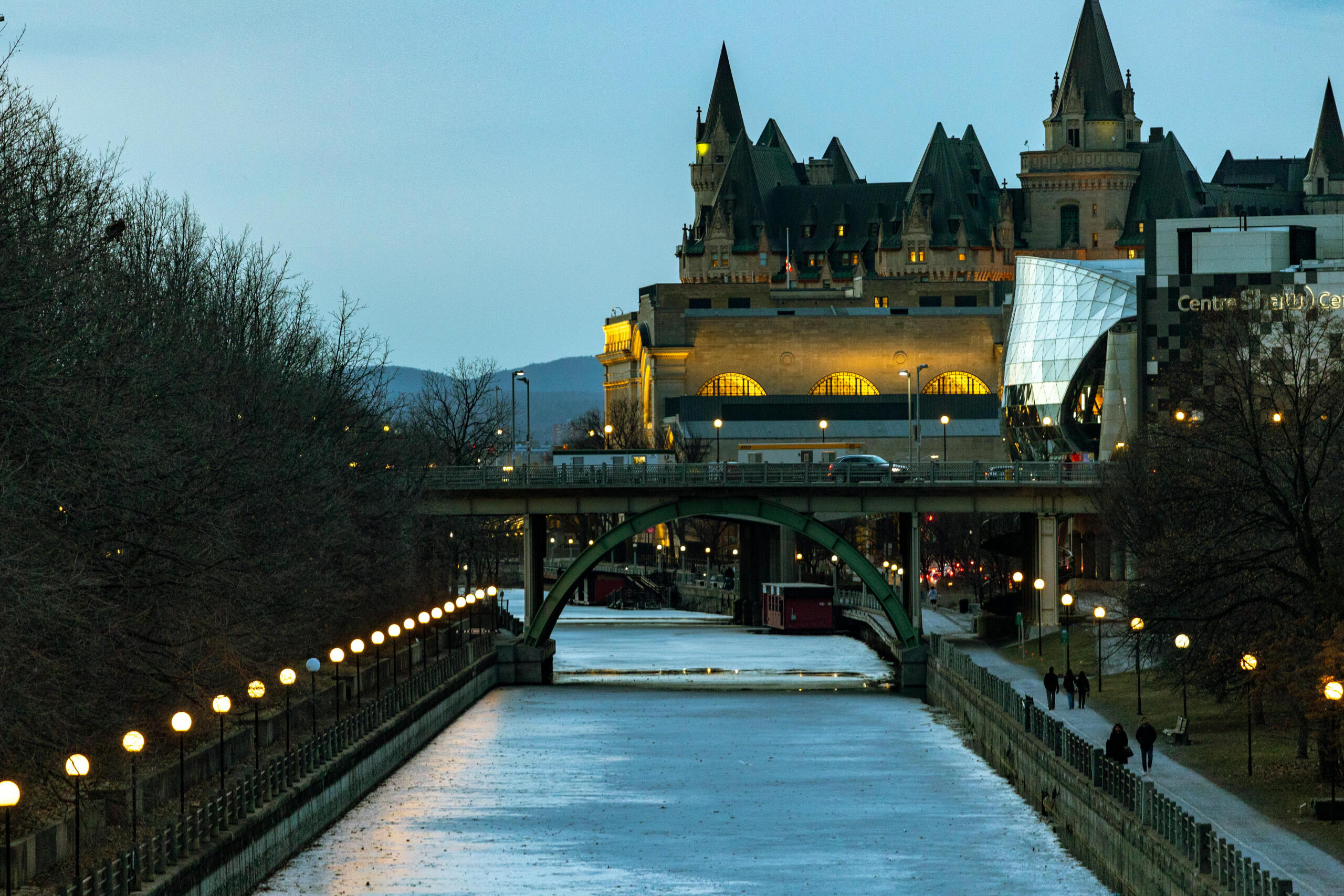 Ottawa's Rideau Canal. a bridge and historic buildings can also be seen.