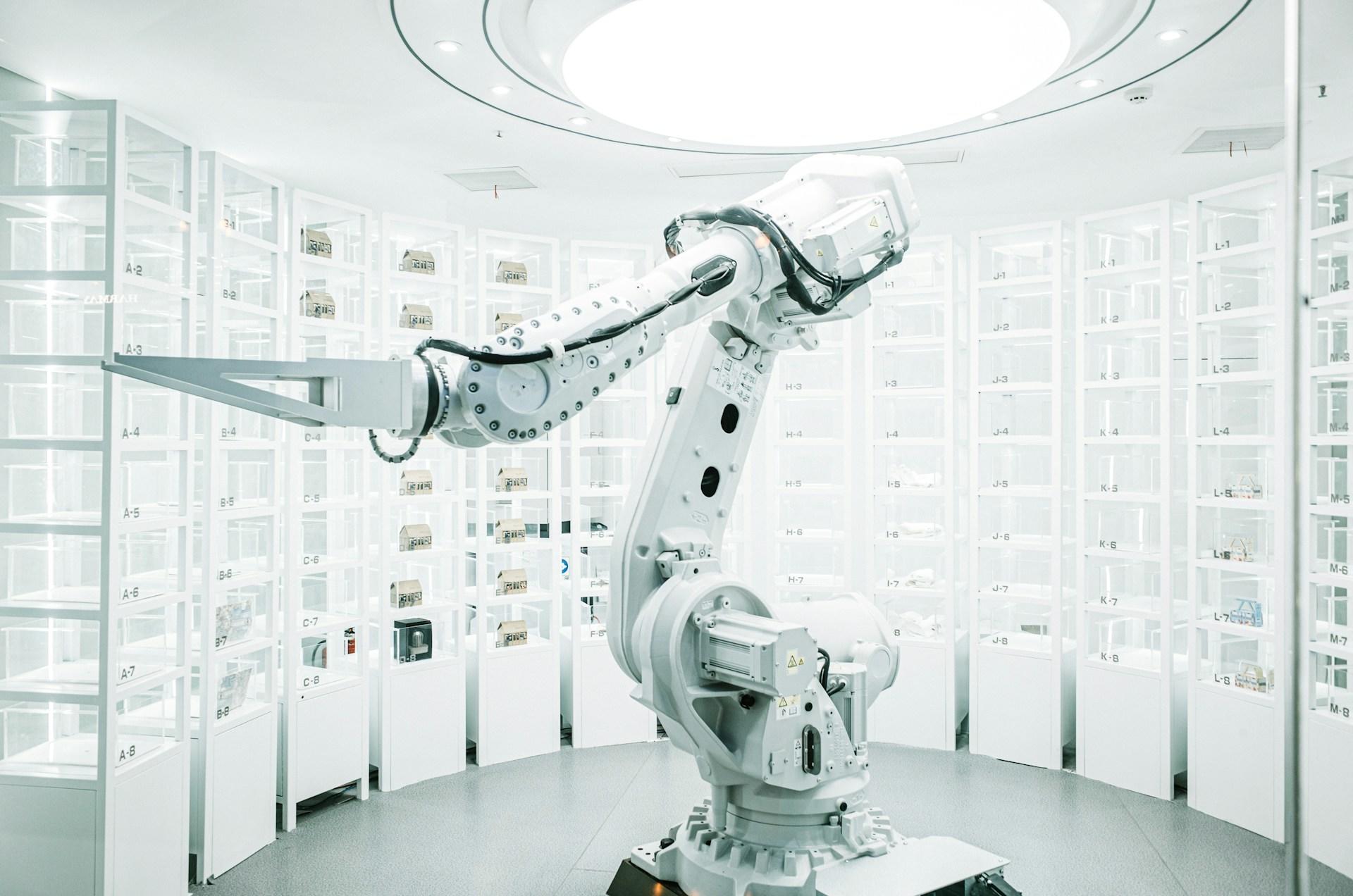 A huge robot tool in a white room.
