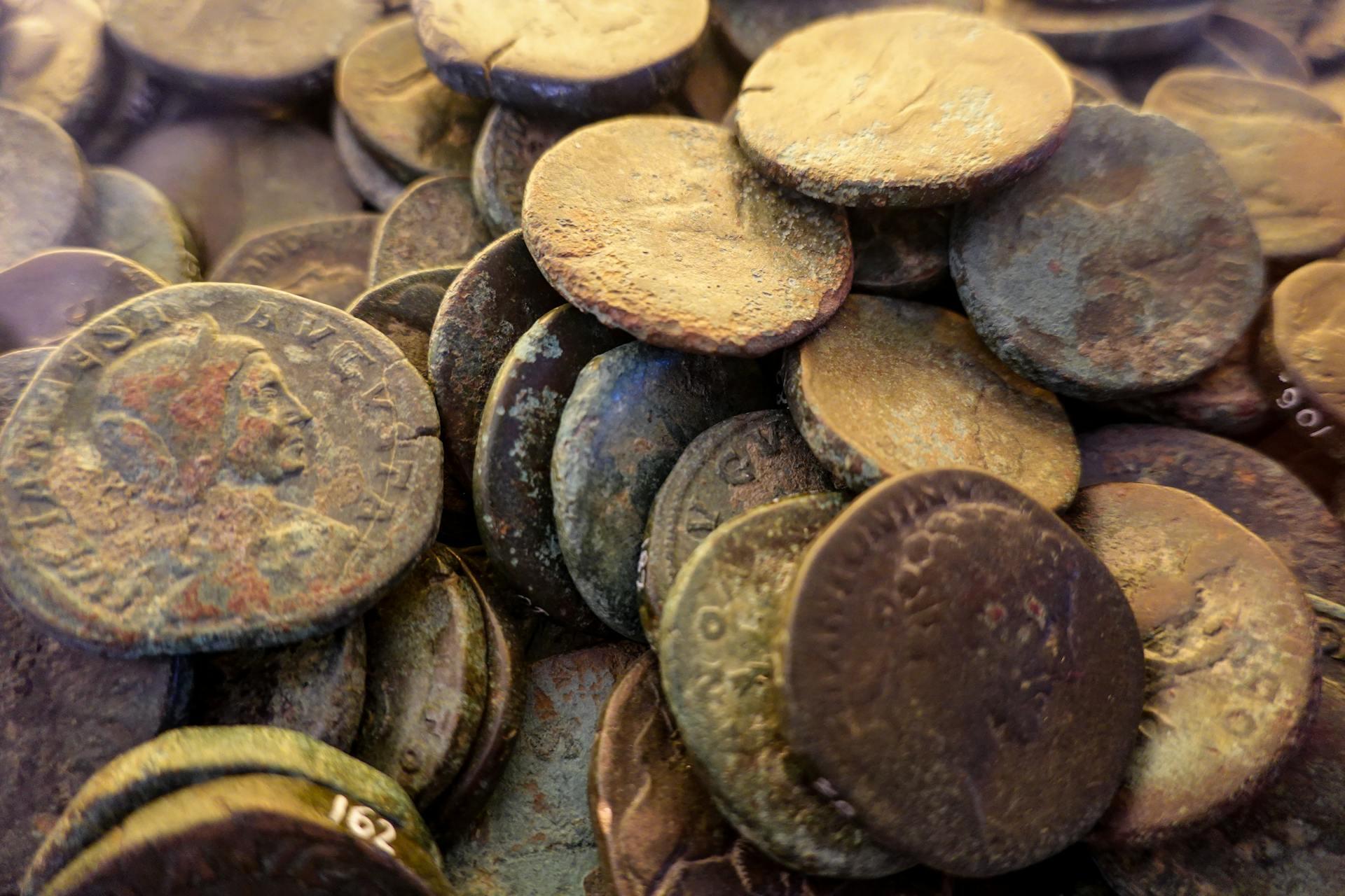 Pile of Ancient Roman Coins with Patina.