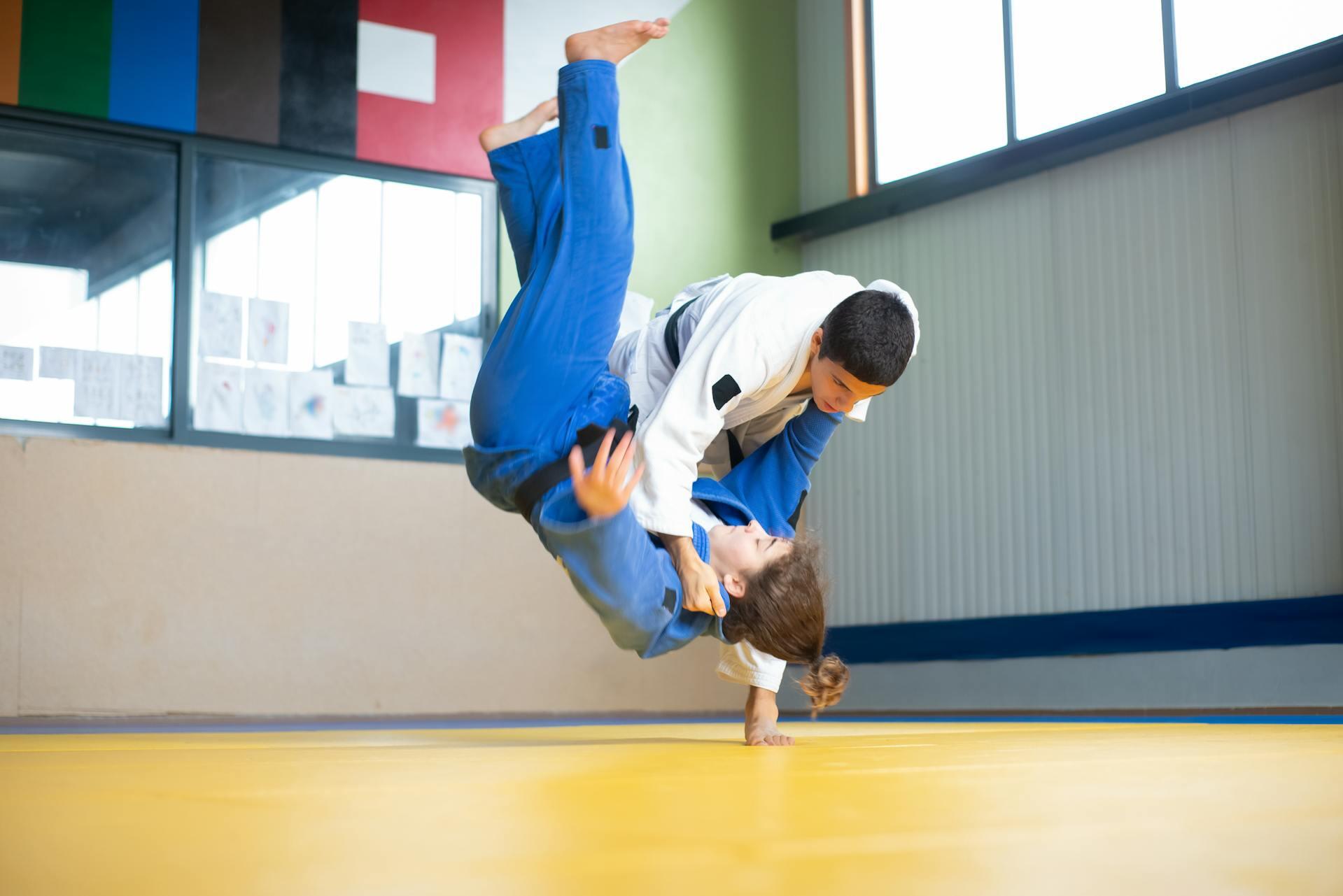 A Judoka Throwing an Opponent.