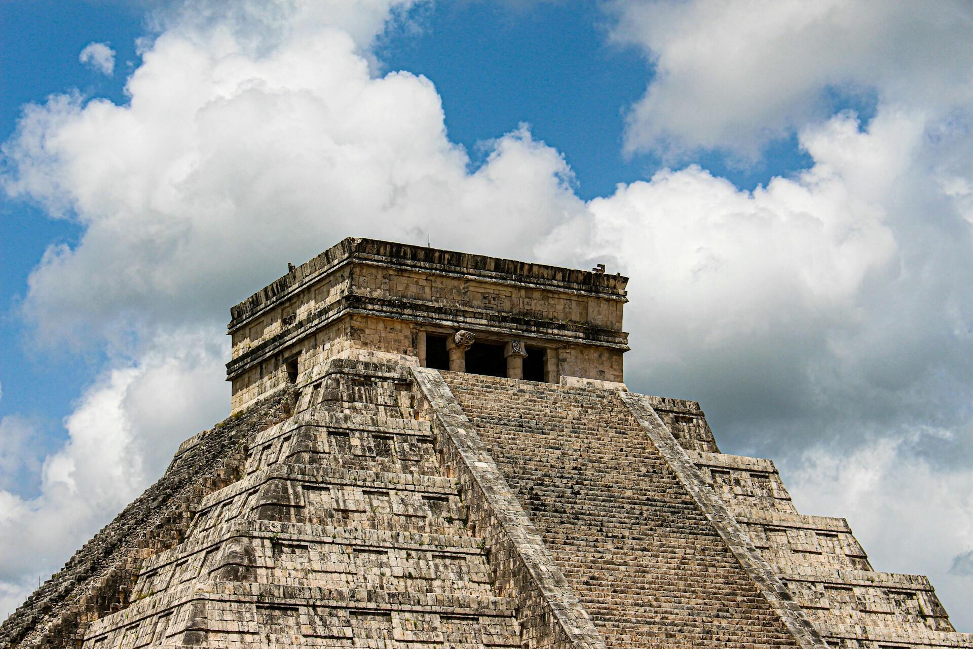 El Castillo pyramid against a cloudy sky at Chichen Itza, Yucatan, Mexico.
