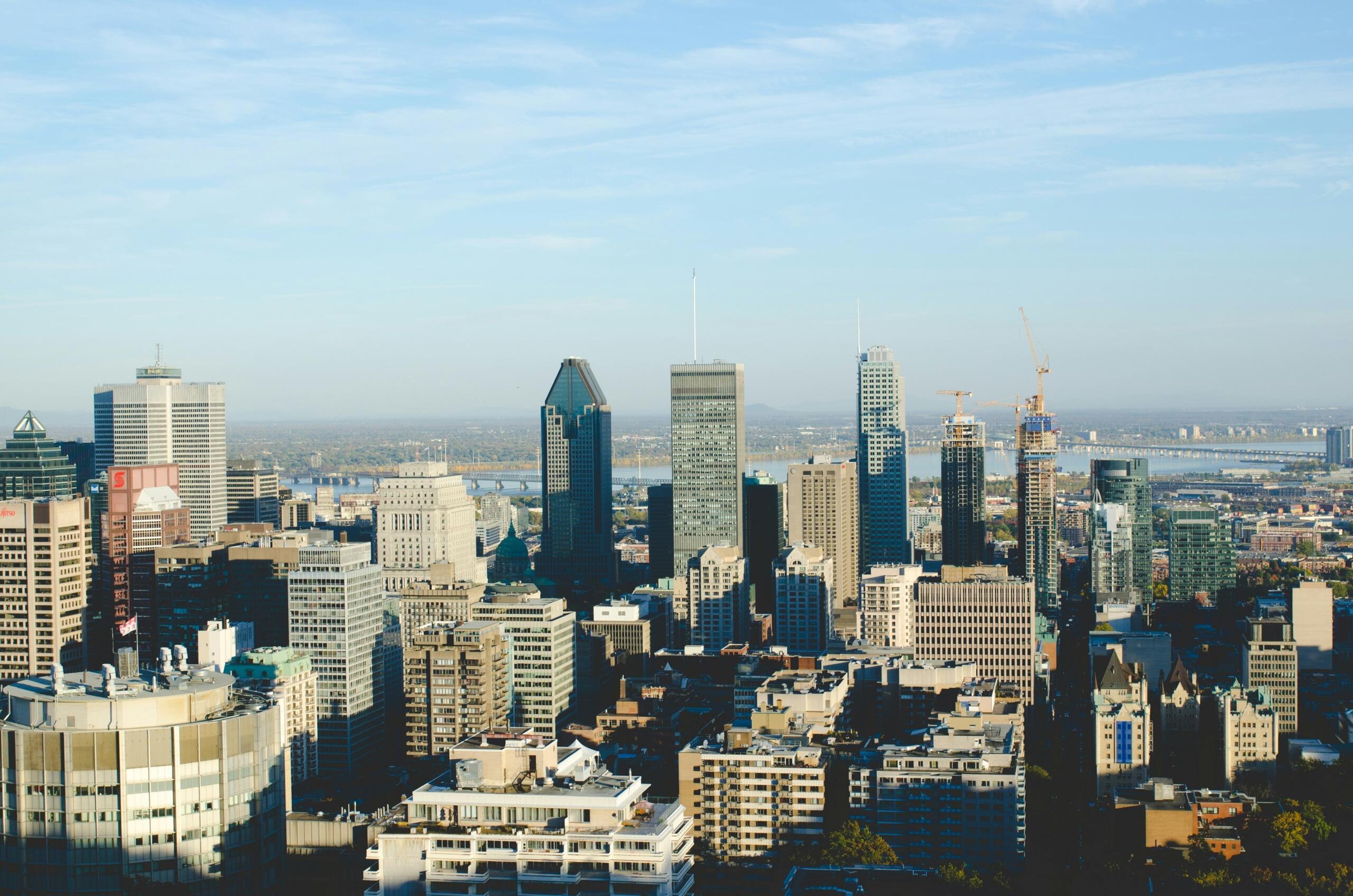 A city skyline. The sky behind is cloudy.