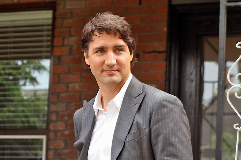 Justin Trudeau delivering a speech on a doorstep.