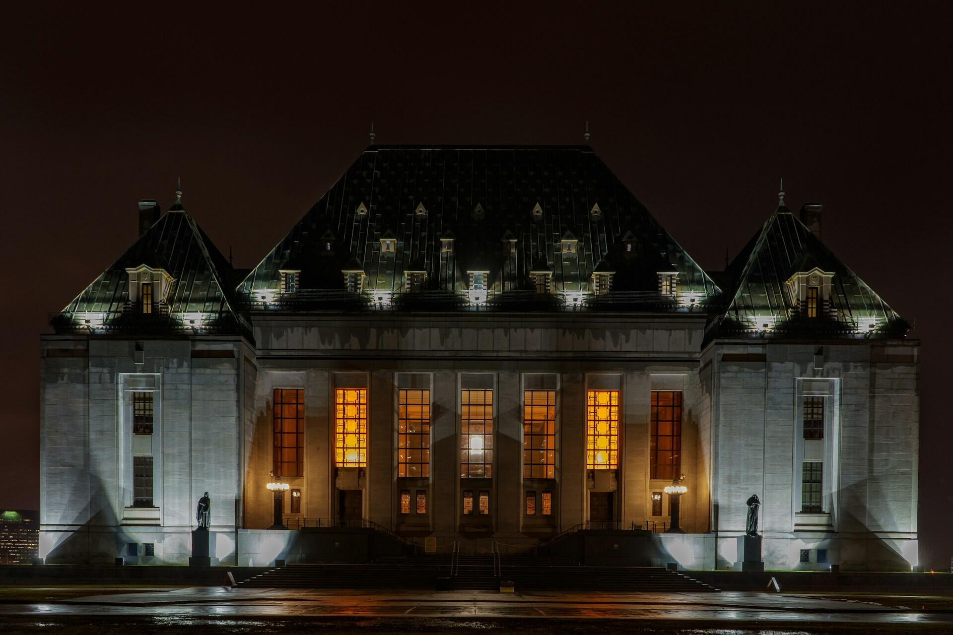 a night view of Canada's supreme high court 