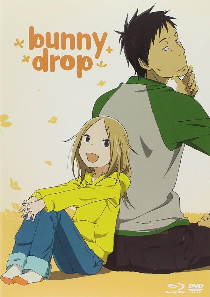 A young girl in a yellow hoodie sits happily against a seated man in a green shirt, surrounded by playful yellow flowers.
