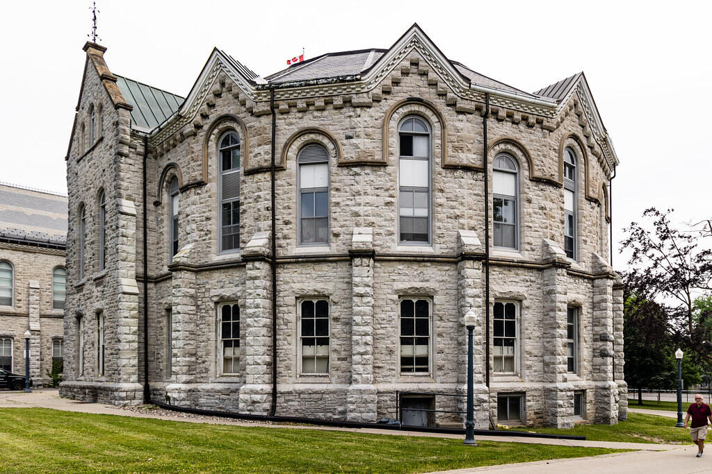 Historic limestone building at Queen’s University in Ontario, Canada, home to various science and biology programs.