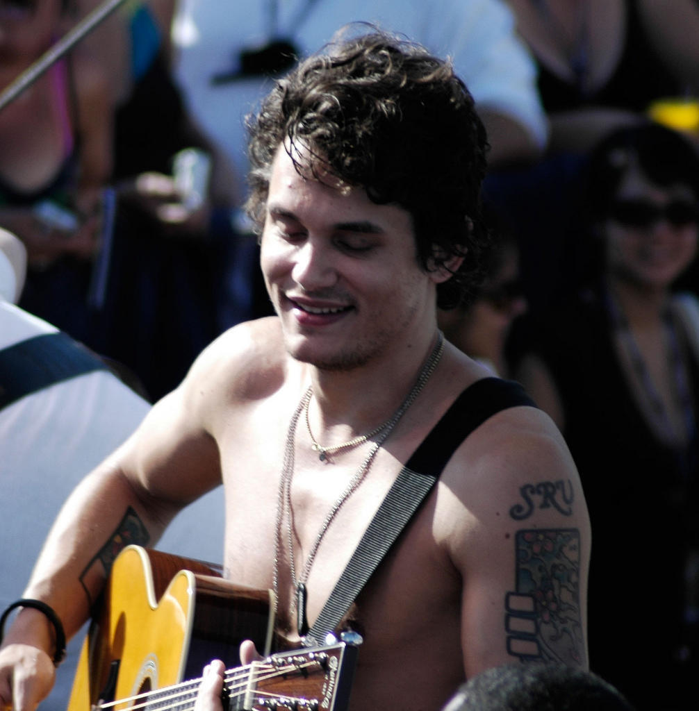 John Mayer on stage shirtless