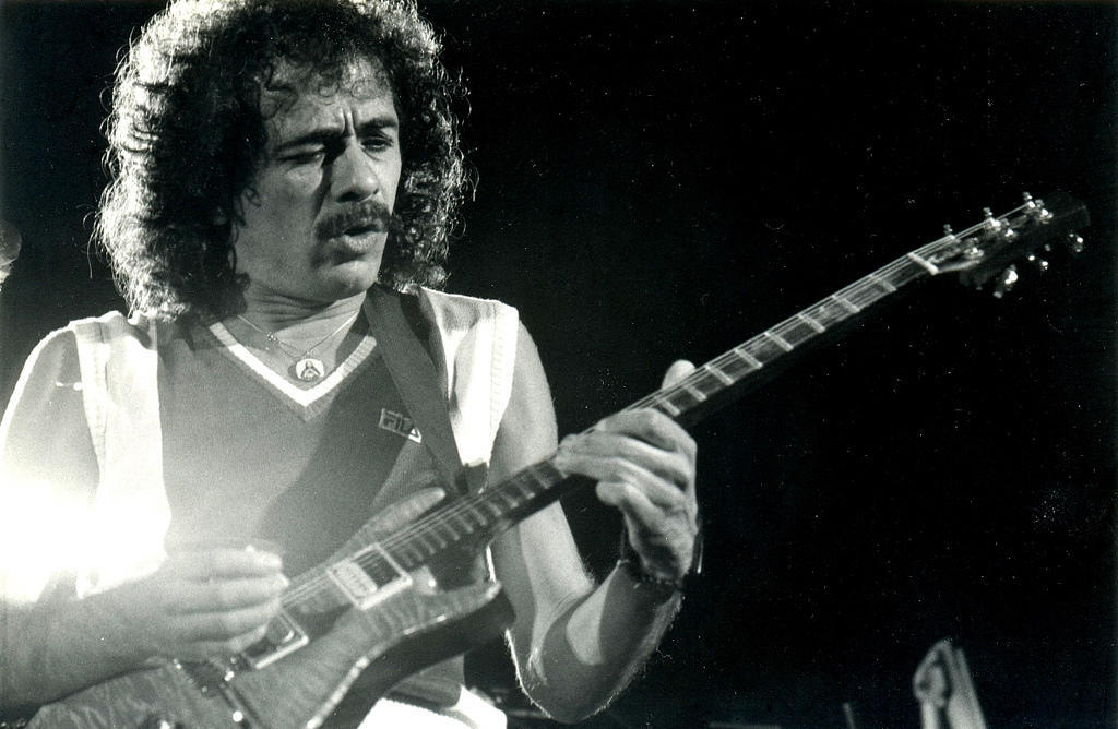 Carlos Santana with guitar onstage 