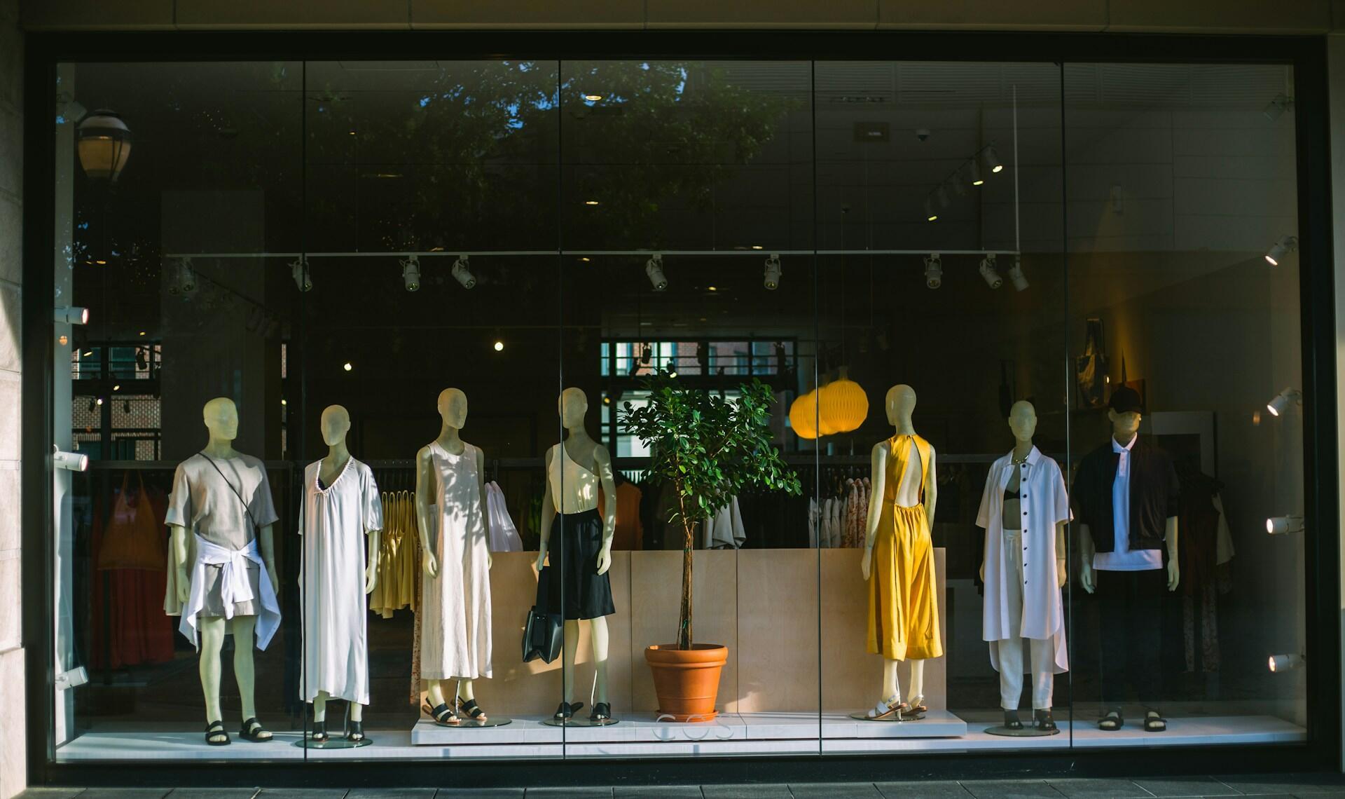 image of a store front with mannequins dressed in clothes