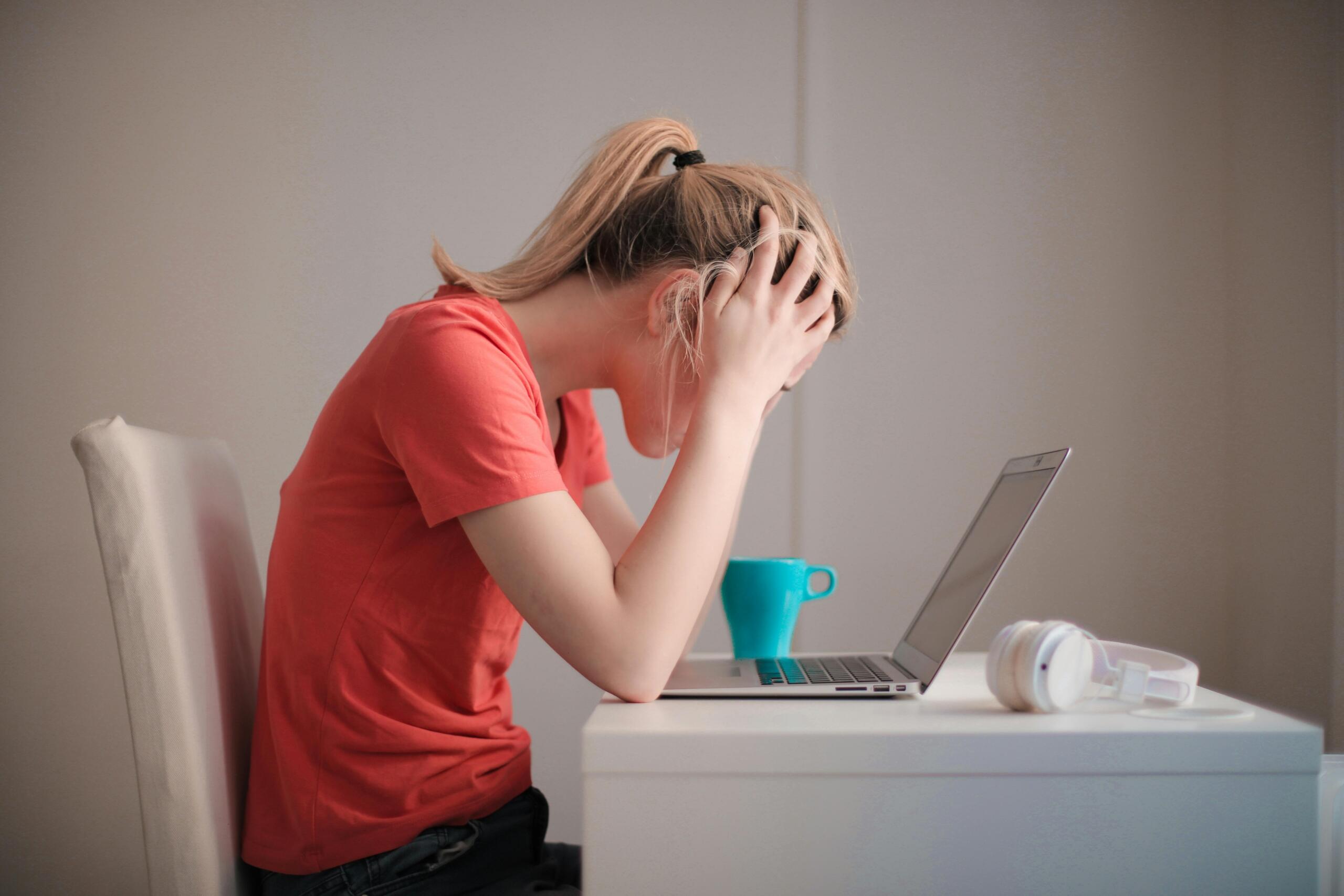 A woman sitting in front of a computer