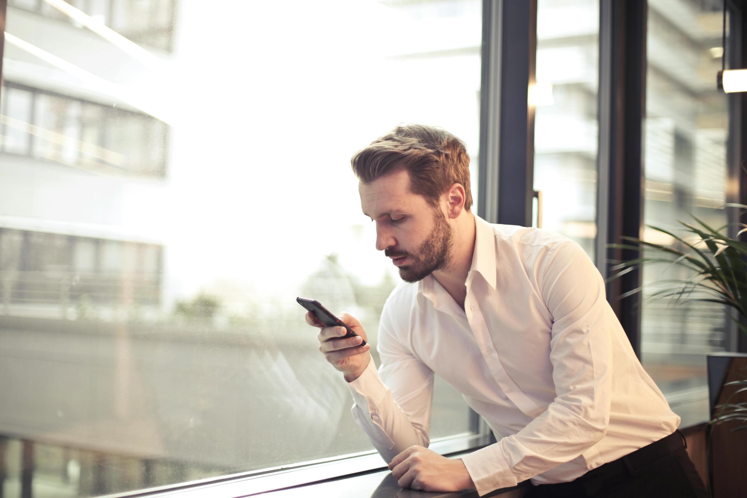 A man looking at his phone