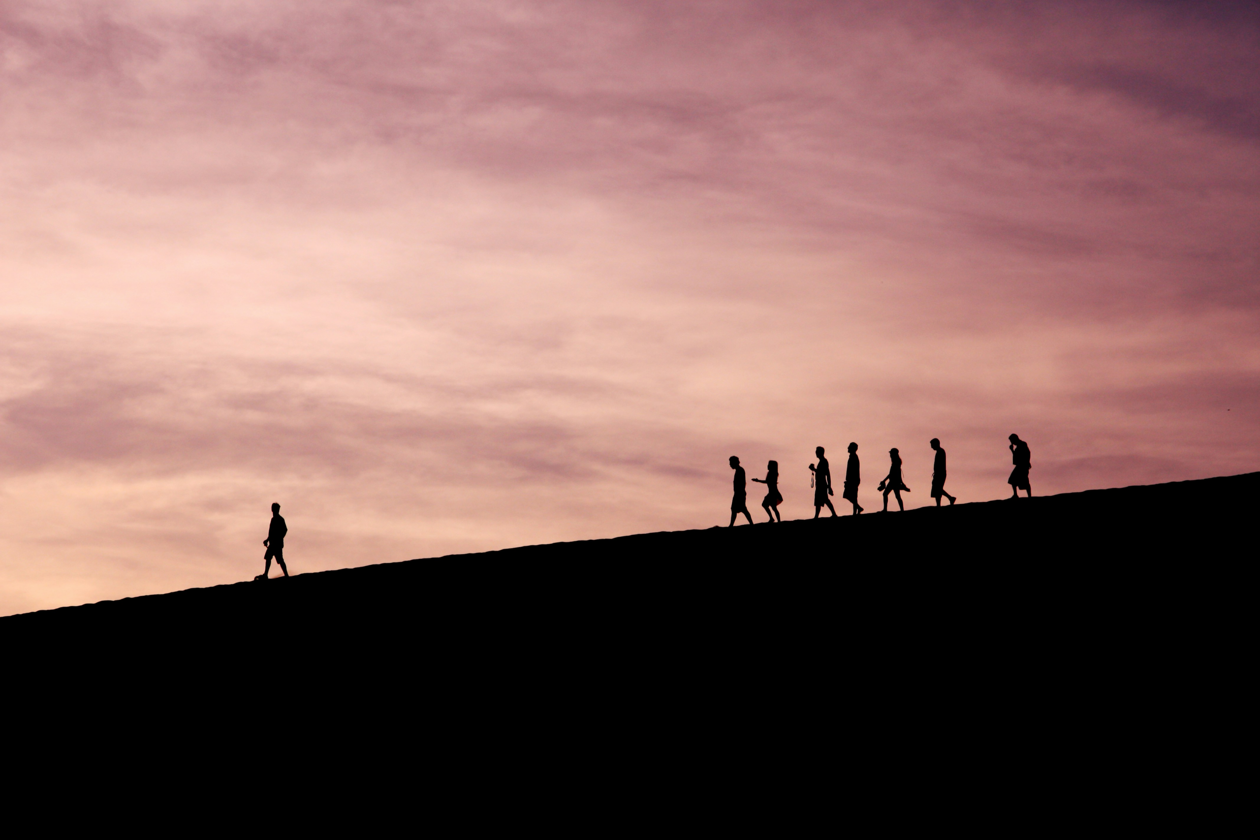 People walking in the dark