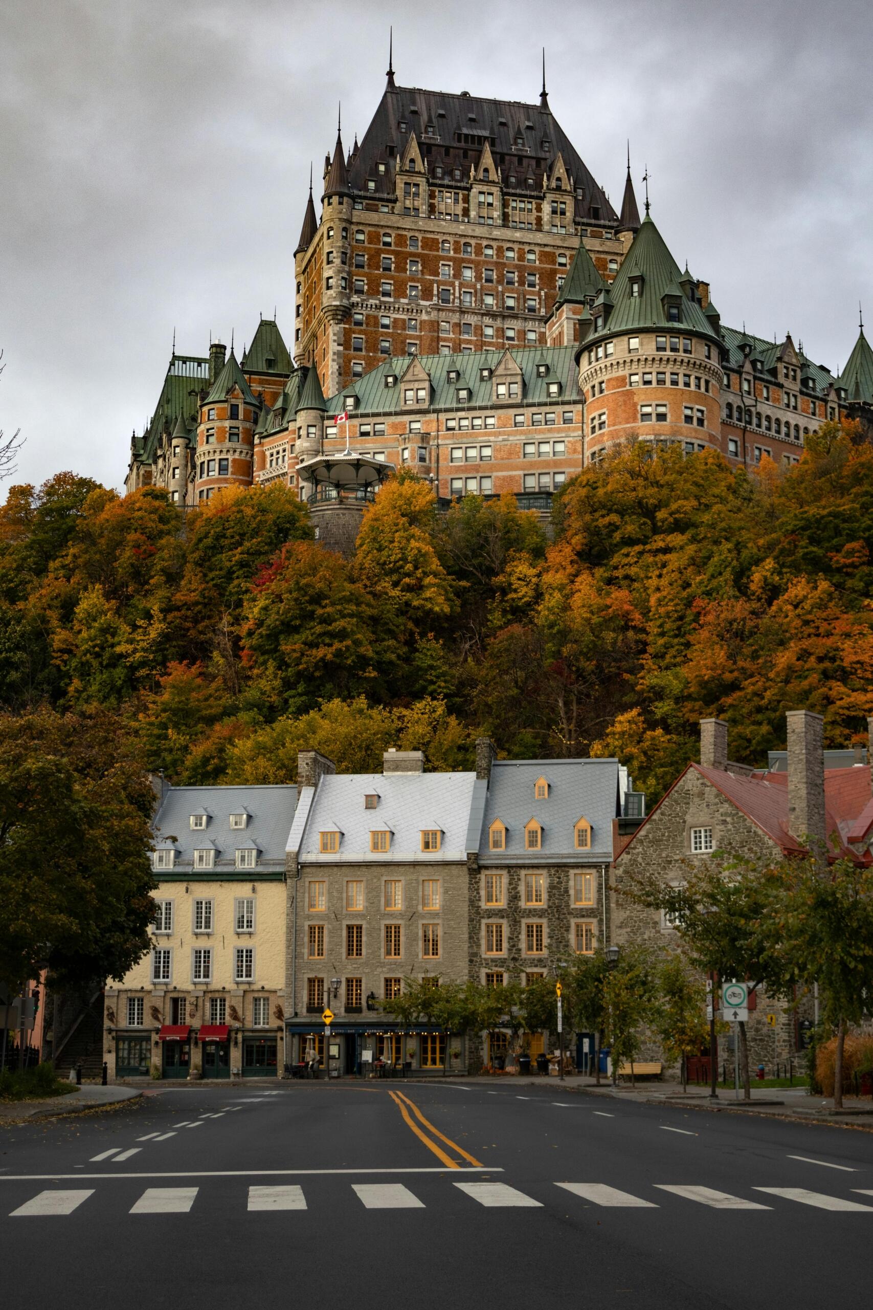 he Château Frontenac in Québec City, a grand castle-like hotel with green copper roofs and stone towers.