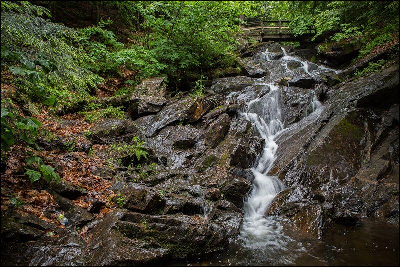 Photograph of Dunlop Falls in Gatineau Park showing the waterfall in motion.