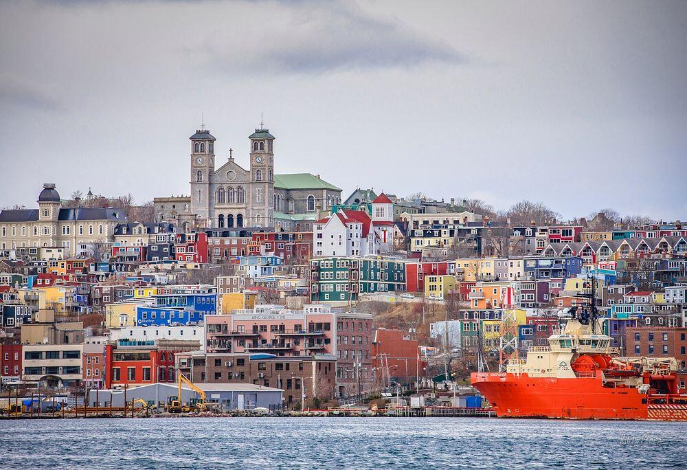 View of St. John’s, Newfoundland and Labrador, the province’s largest city and main population centre, with colourful hillside homes overlooking the harbour.